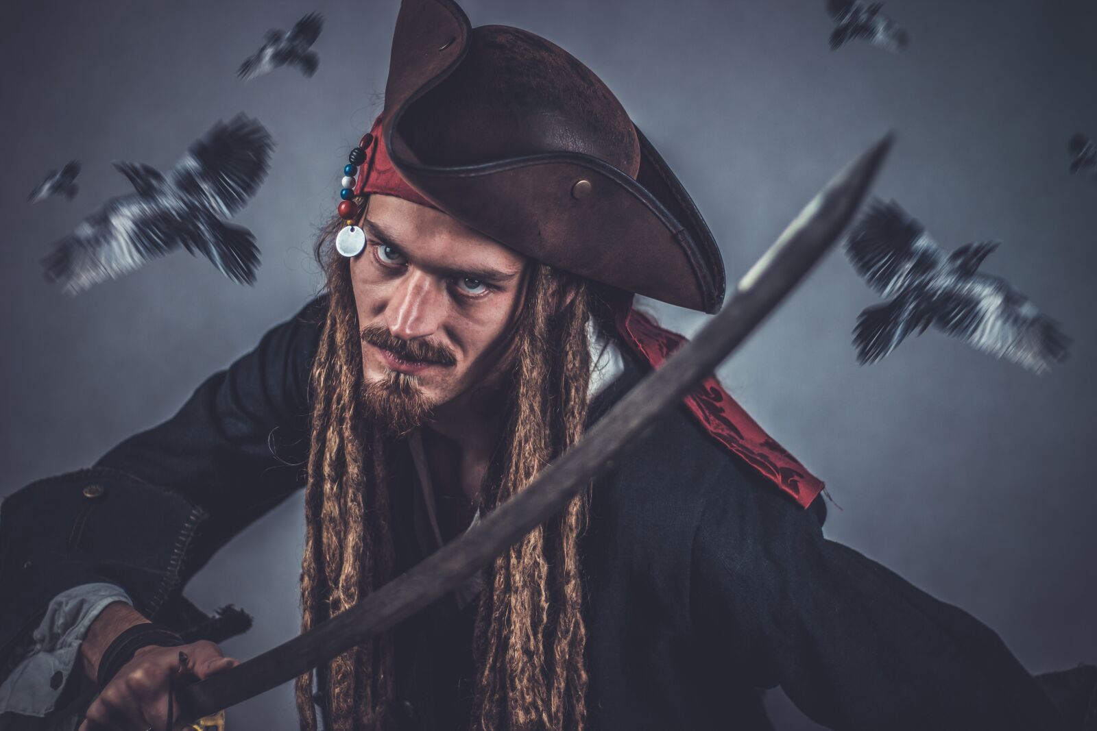 Canon EOS 600D (Rebel EOS T3i / EOS Kiss X5) + Canon EF 50mm F1.8 STM sample photo. Pirate, sword, pirate head photography