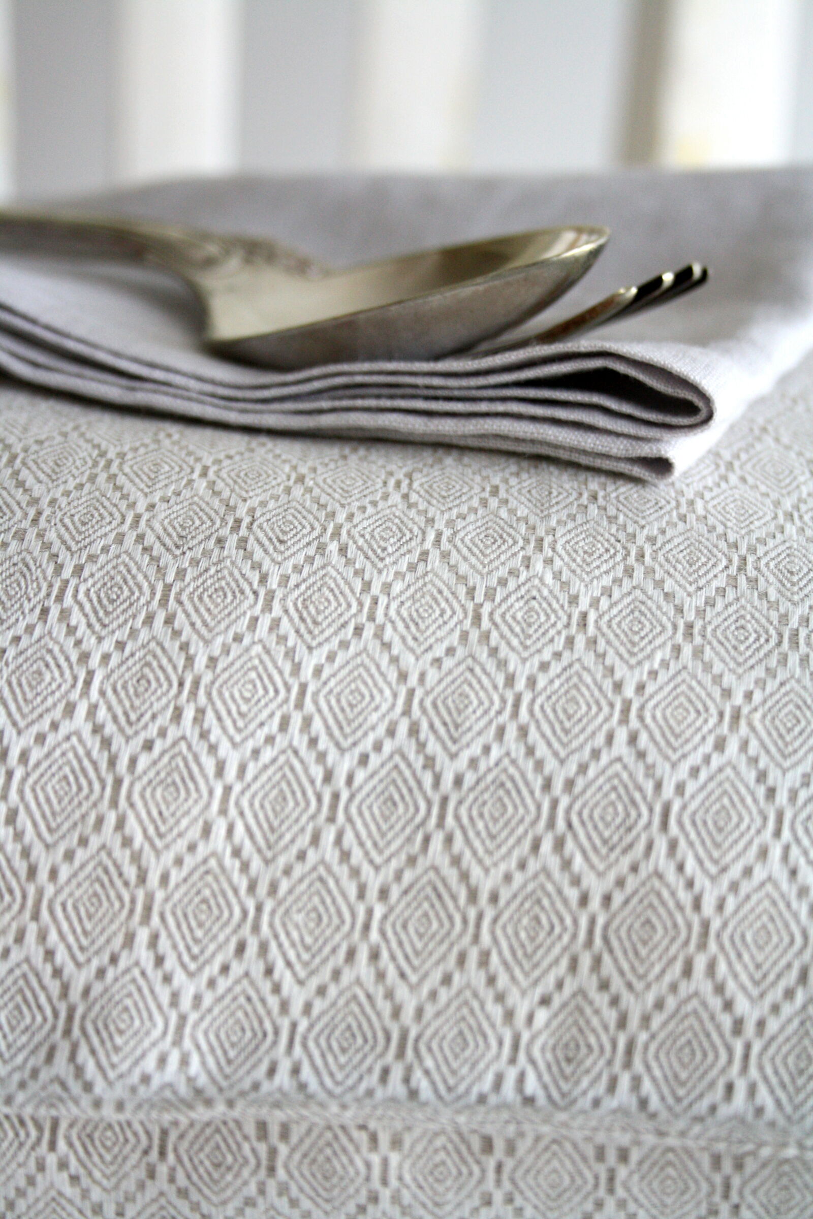 Canon EF-S 18-55mm F3.5-5.6 II sample photo. Cutlery, pillow, spoon photography