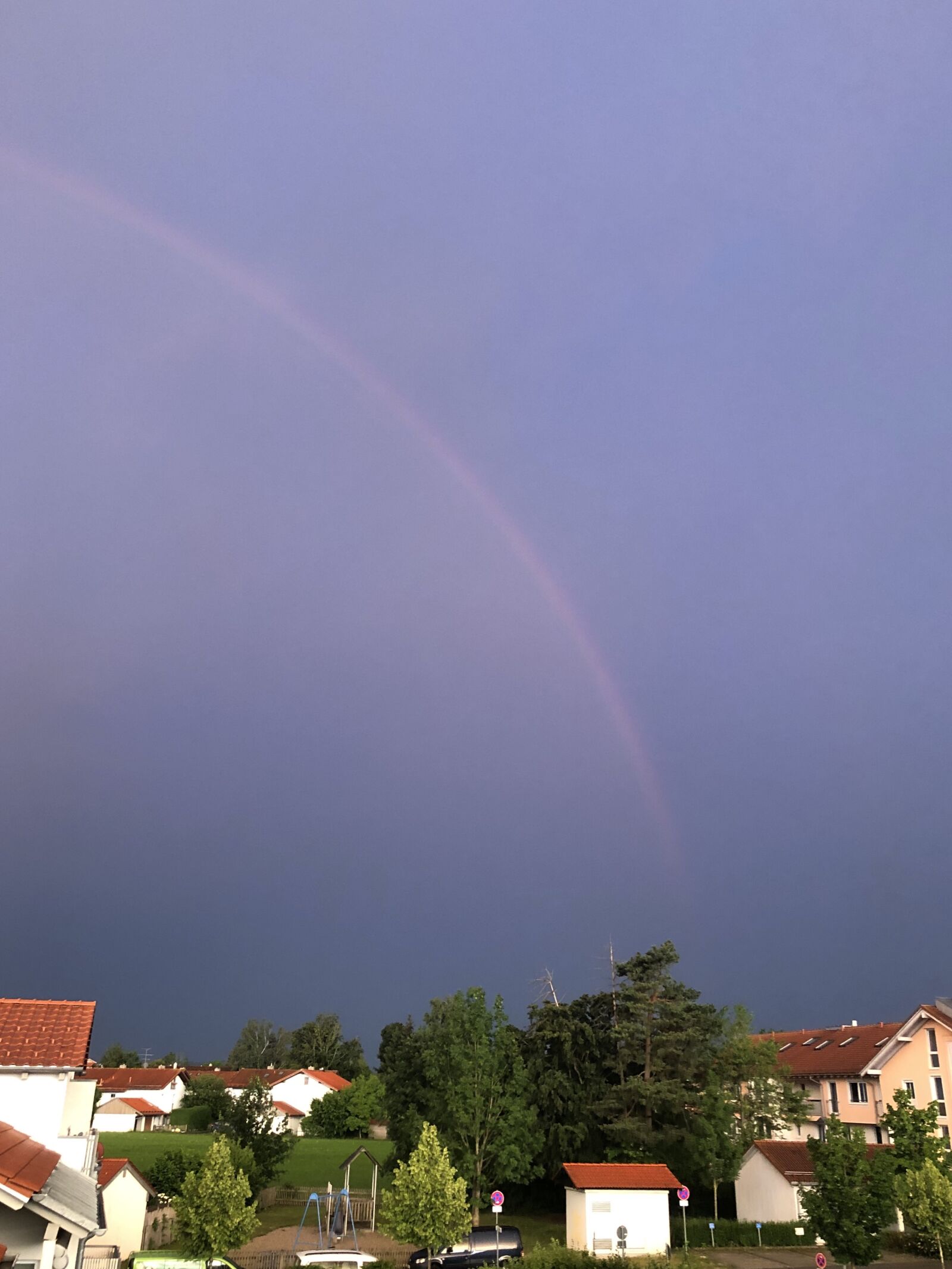 iPhone X back dual camera 4mm f/1.8 sample photo. Rainbow, weather, sky photography