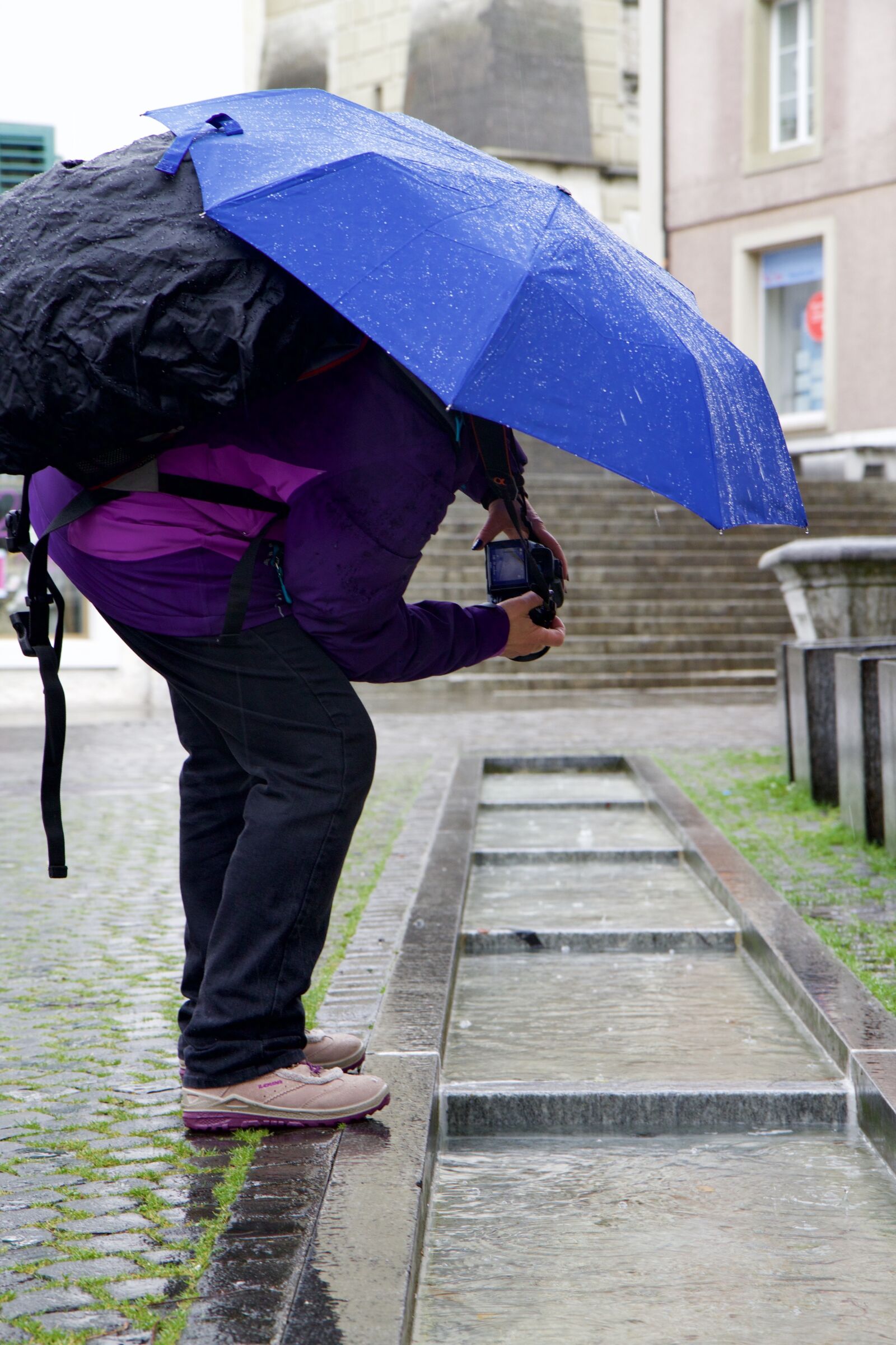 Canon EOS 70D sample photo. Photographer, umbrella, water photography