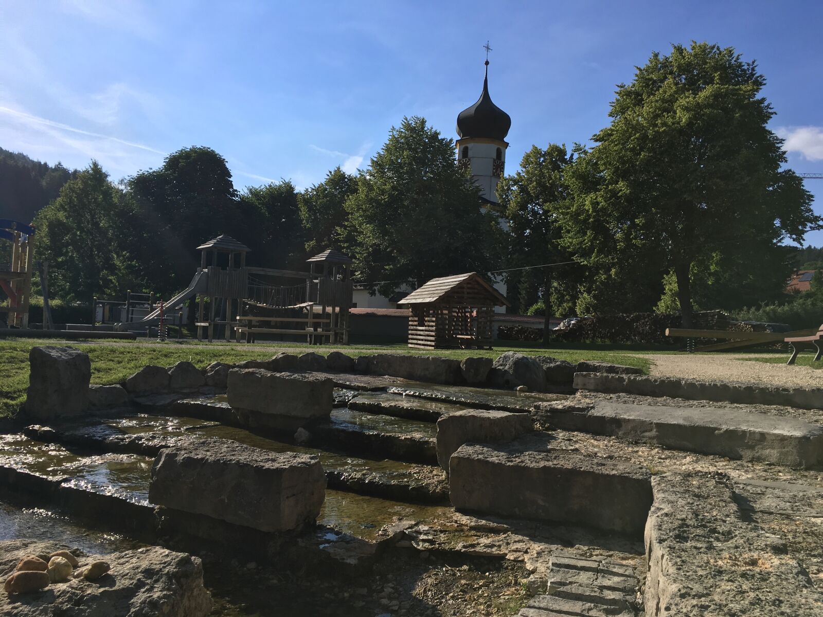 iPhone SE back camera 4.15mm f/2.2 sample photo. Village idyll, playground, water photography