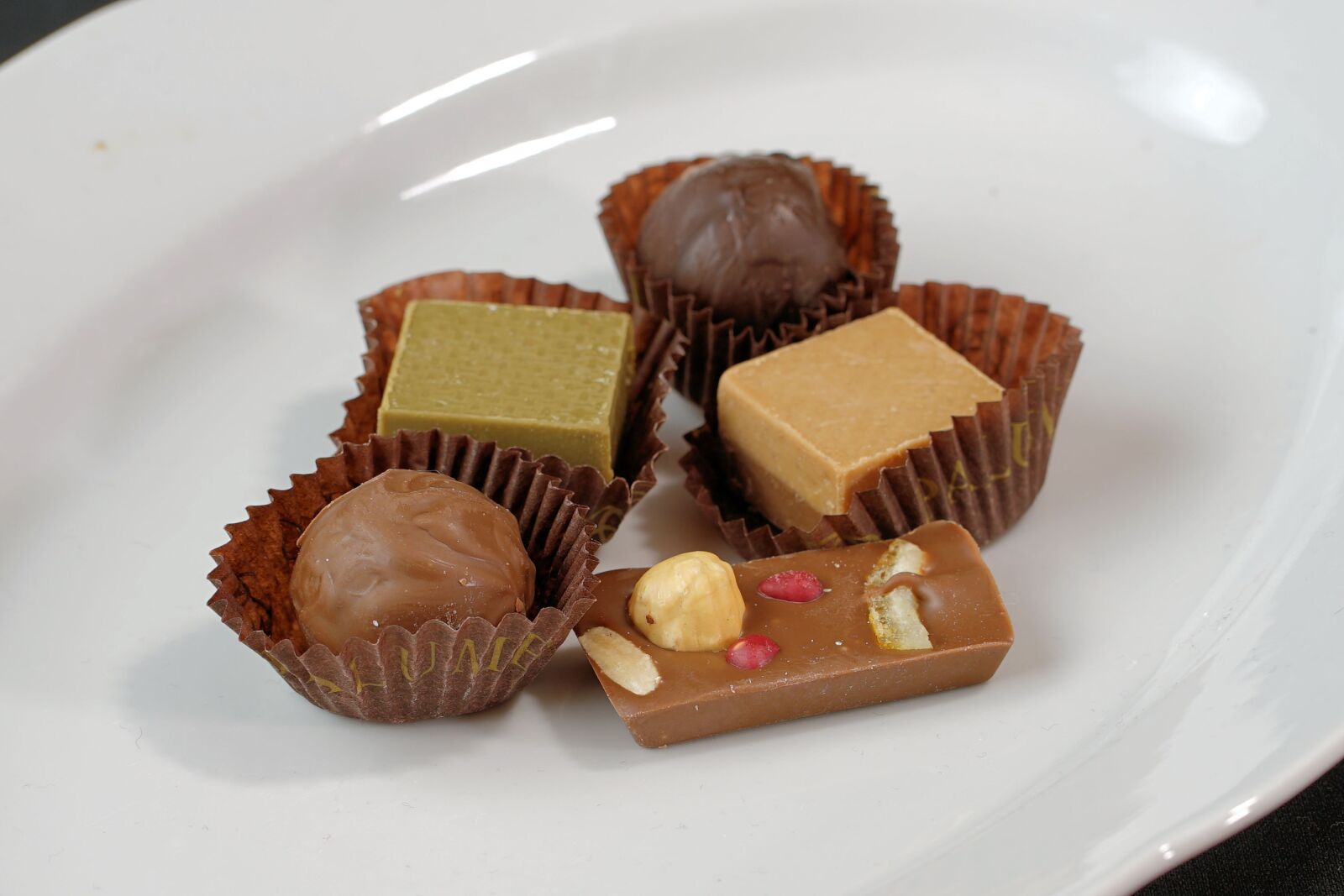 Sony a7 II + Sony FE 85mm F1.8 sample photo. Praline, chocolate, food photography