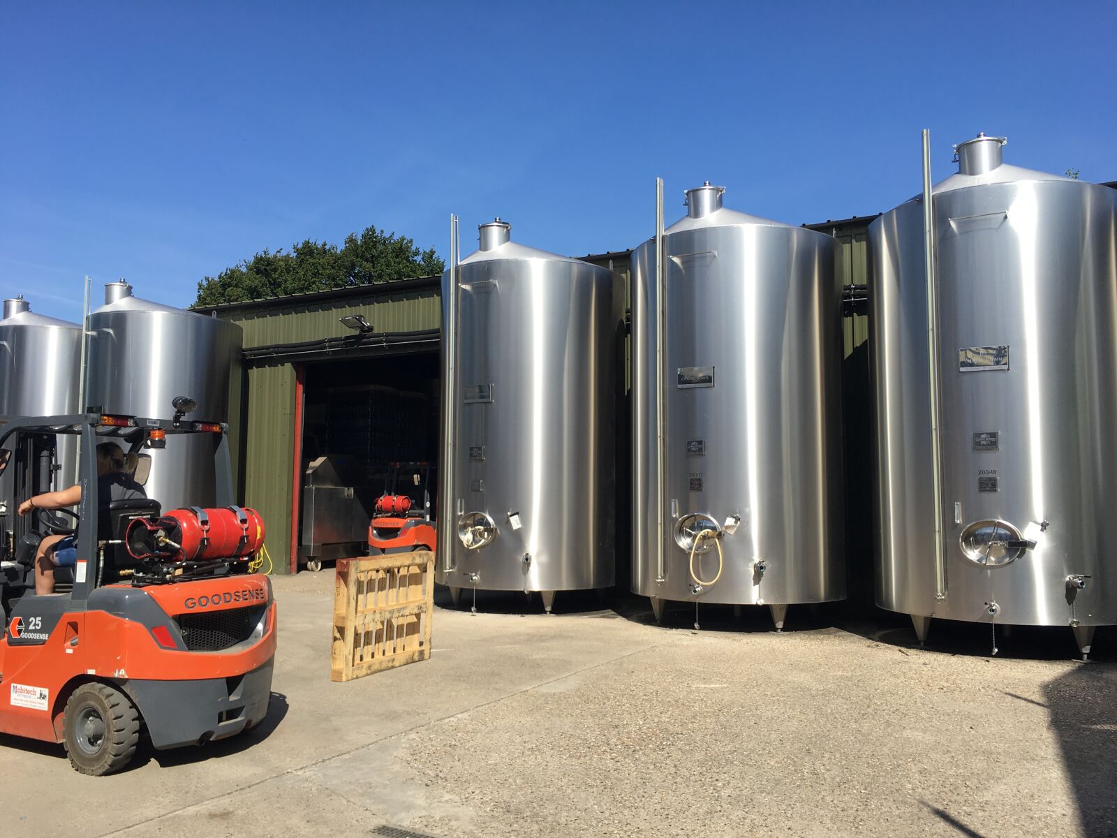 iPhone 6s Plus back camera 4.15mm f/2.2 sample photo. Industrial, brewery, forklift photography