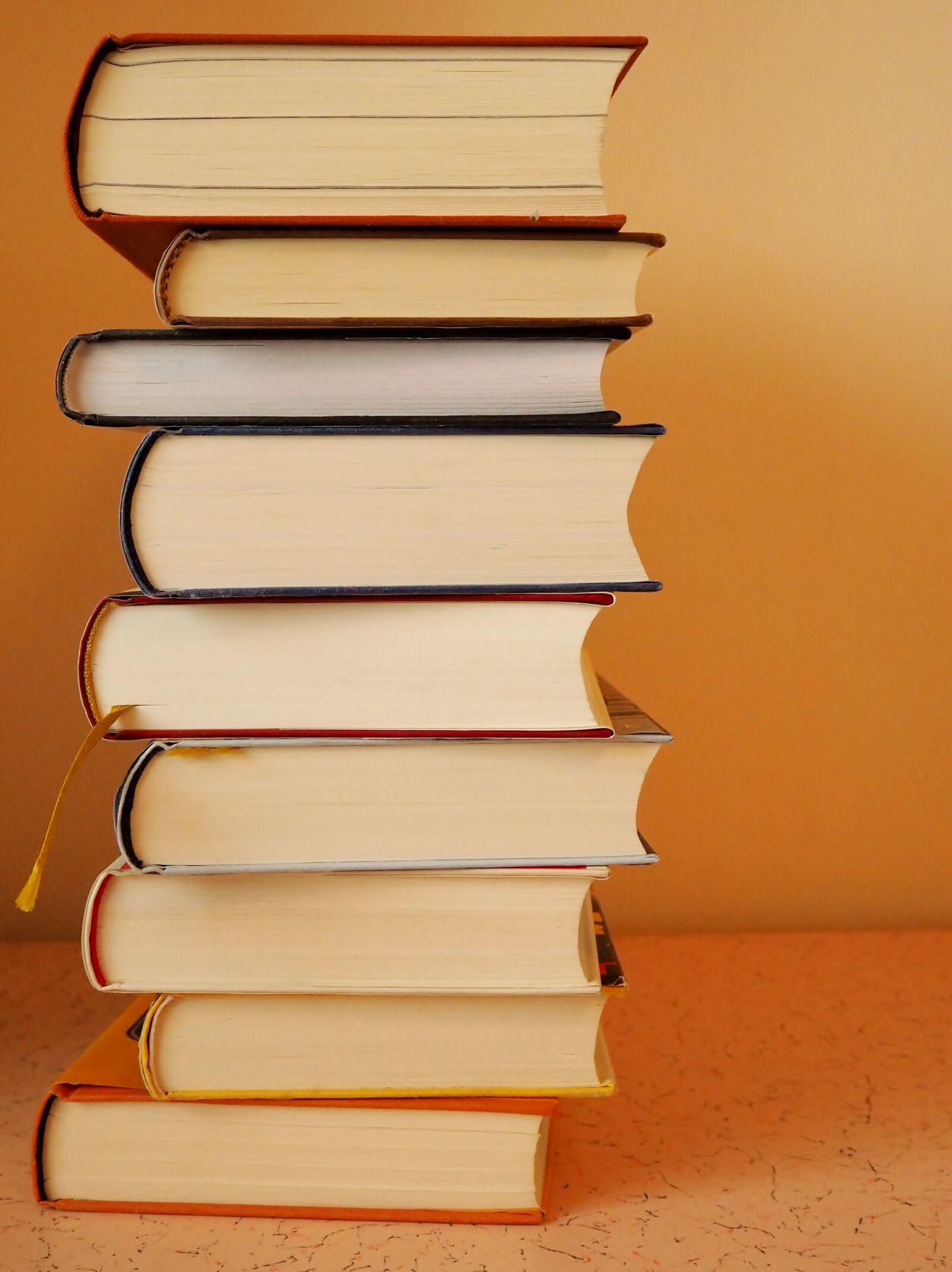 Olympus OM-D E-M10 sample photo. Books, stack, book stack photography