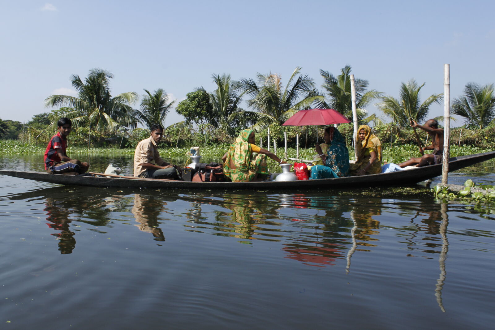 Canon EOS 500D (EOS Rebel T1i / EOS Kiss X3) sample photo. Bangladesh, boat, canal, fisherman photography