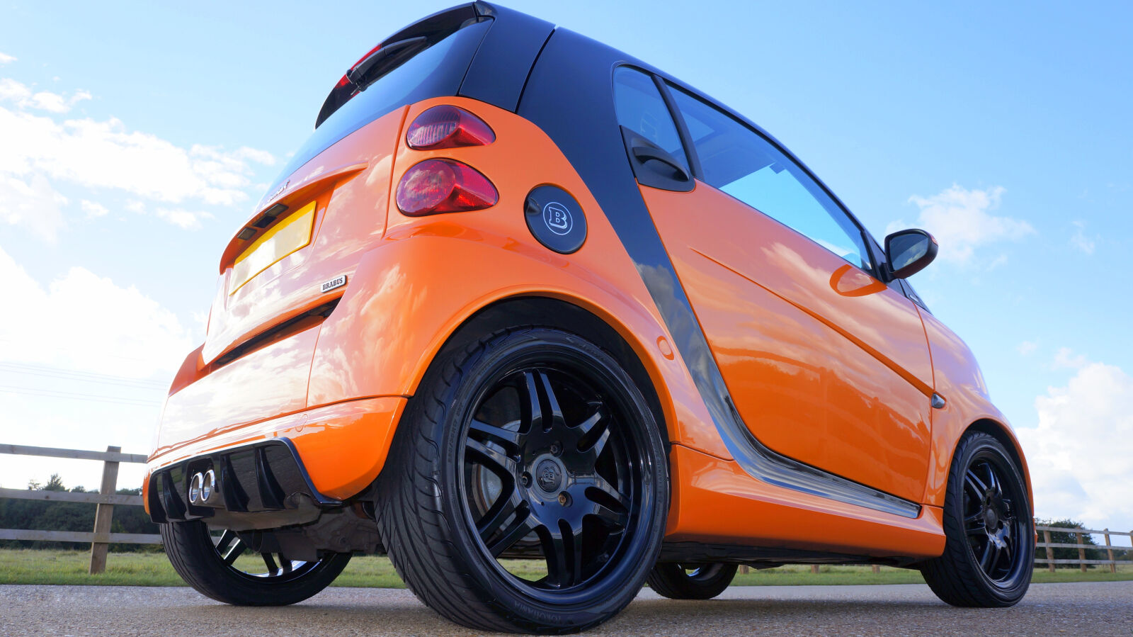 Sony Alpha NEX-5N + Sony E 18-55mm F3.5-5.6 OSS sample photo. Brabus, car, orange, smart photography