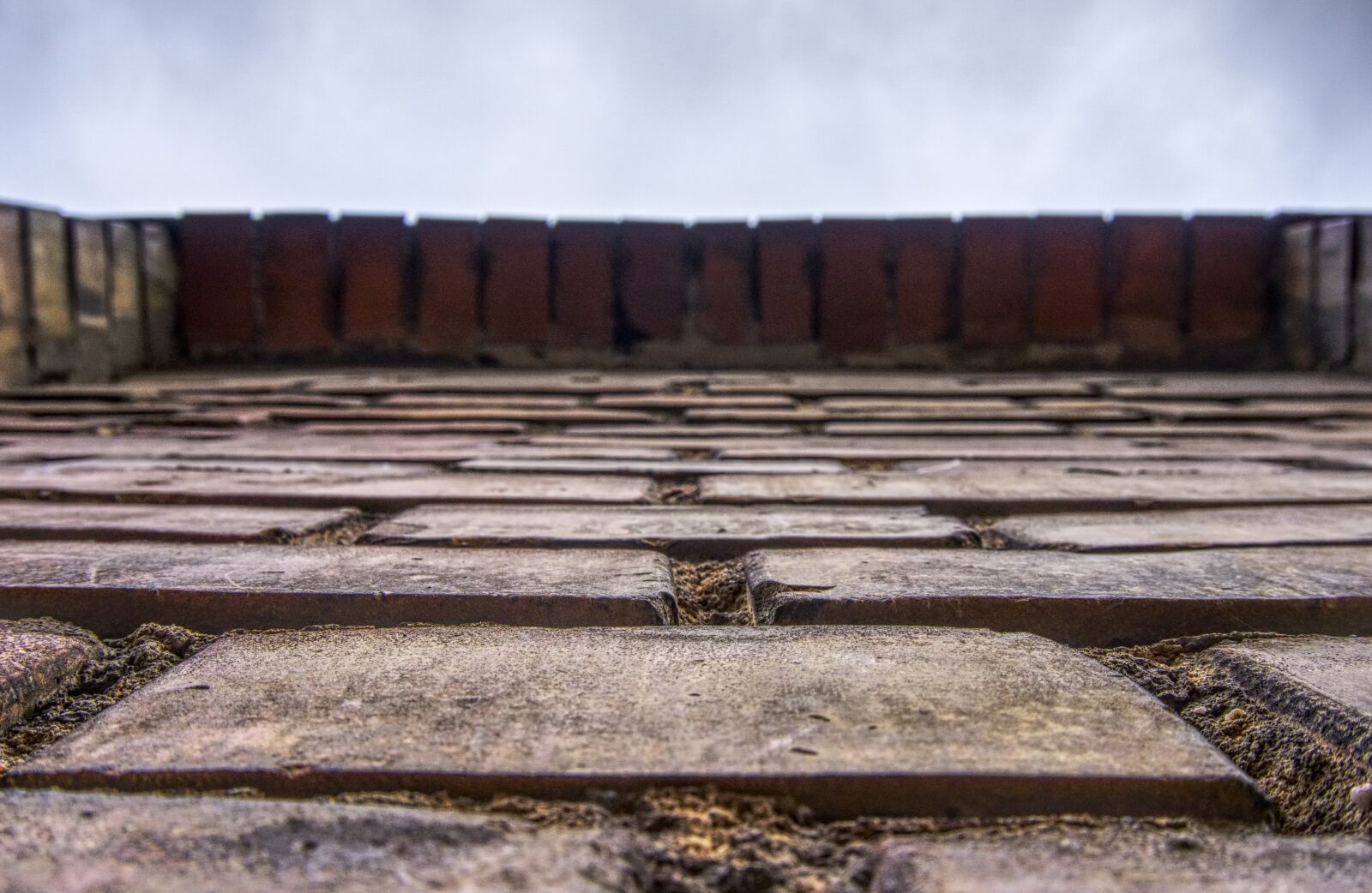 Sony E 16-50mm F3.5-5.6 PZ OSS sample photo. Wall, masonry, sky photography
