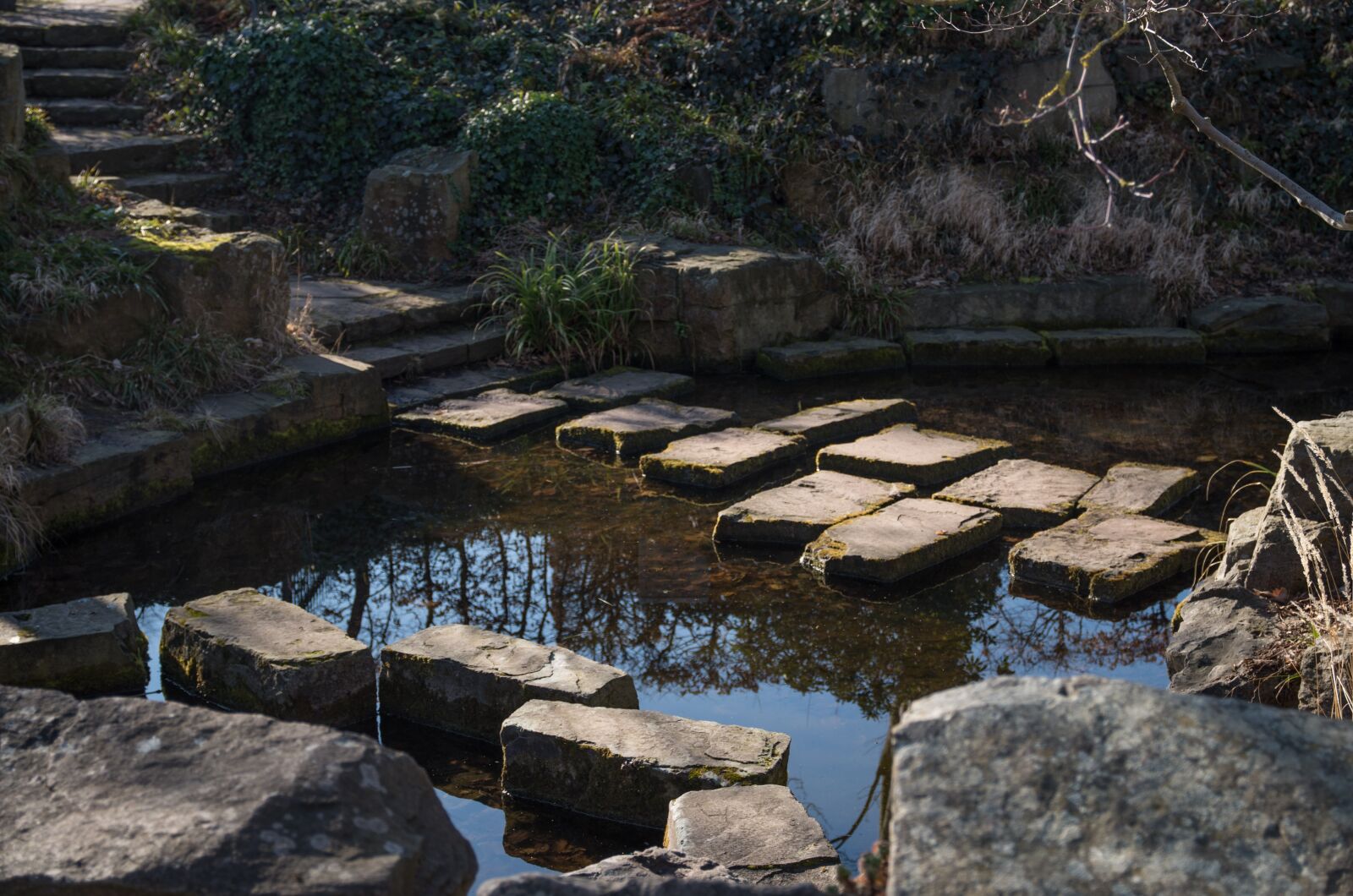 Pentax K-50 sample photo. Pond, stones, away photography