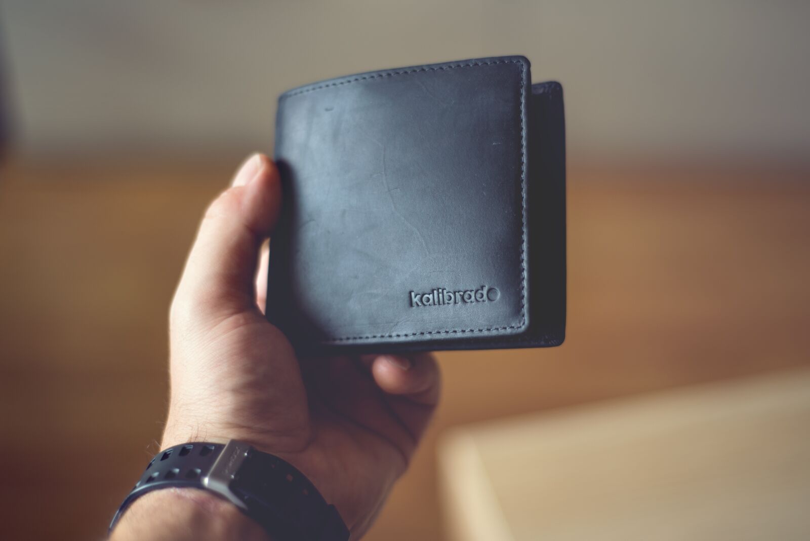Nikon D610 sample photo. Wallet, watch, hand photography