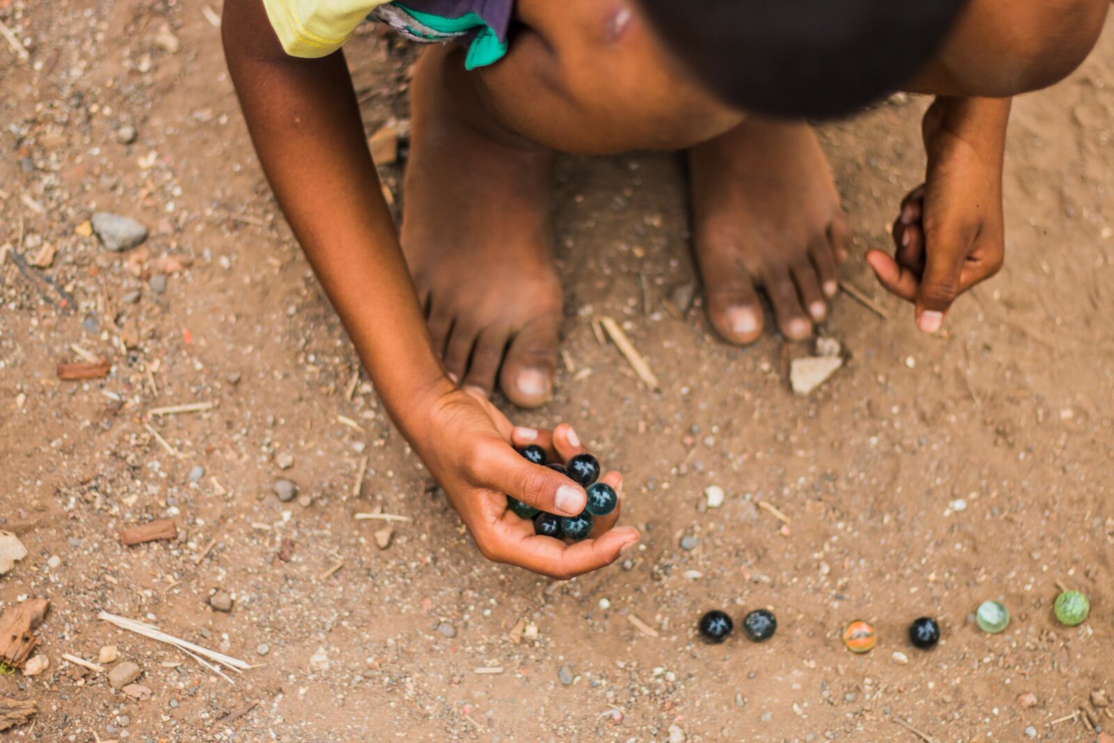 Canon EOS 70D + Canon EF 50mm F1.8 II sample photo. Kid, game, indian photography