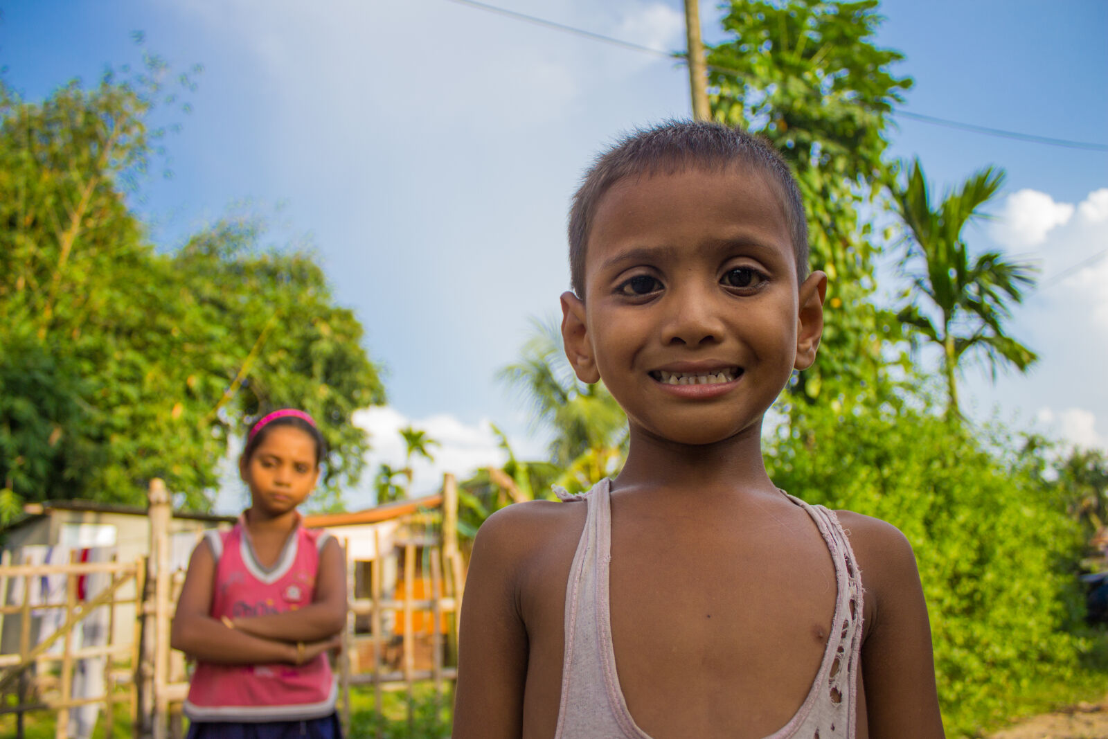Canon EOS 700D (EOS Rebel T5i / EOS Kiss X7i) sample photo. Boy, indian, poverty, smile photography