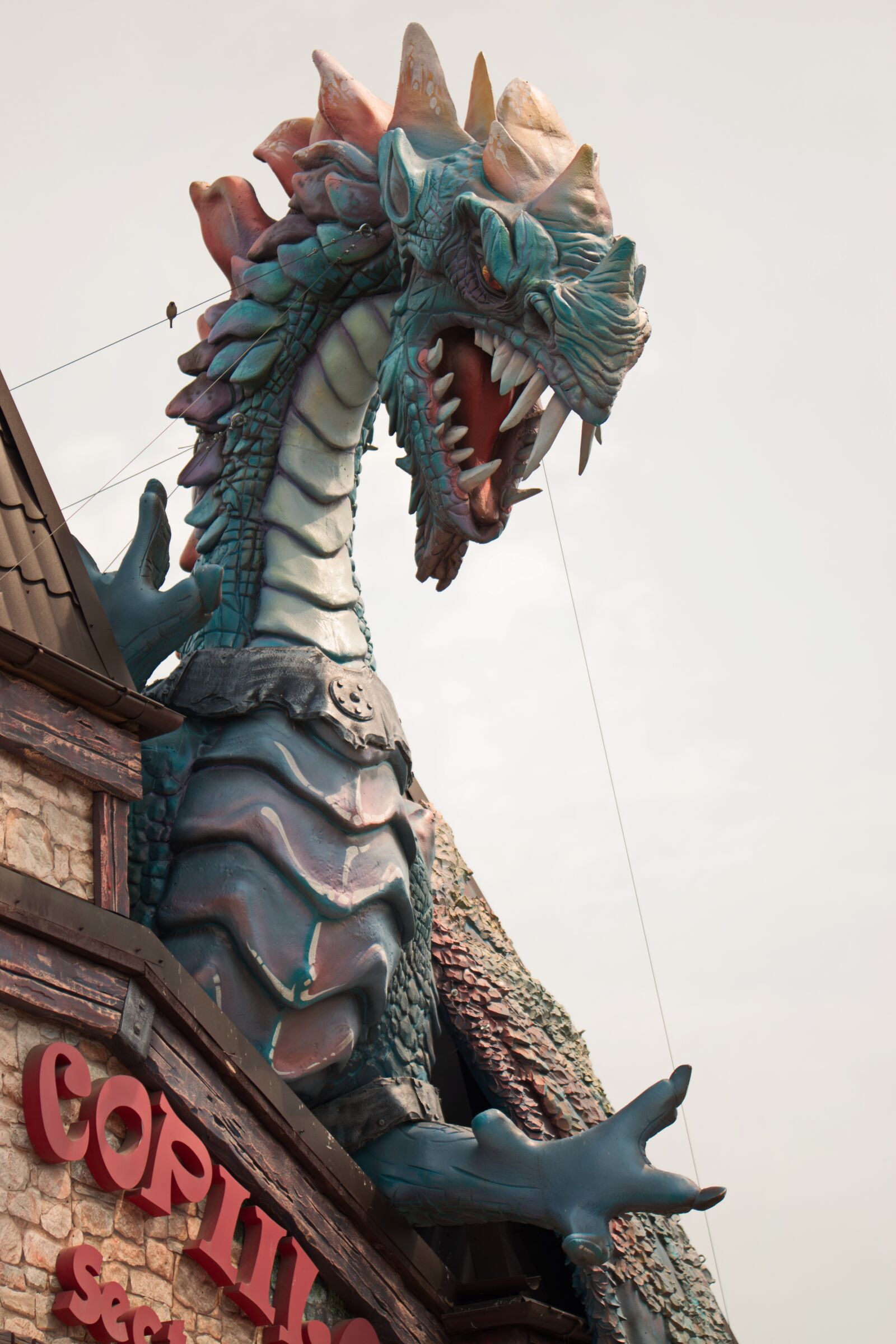 Nikon D5300 sample photo. Figurine, amusement park, dragon photography