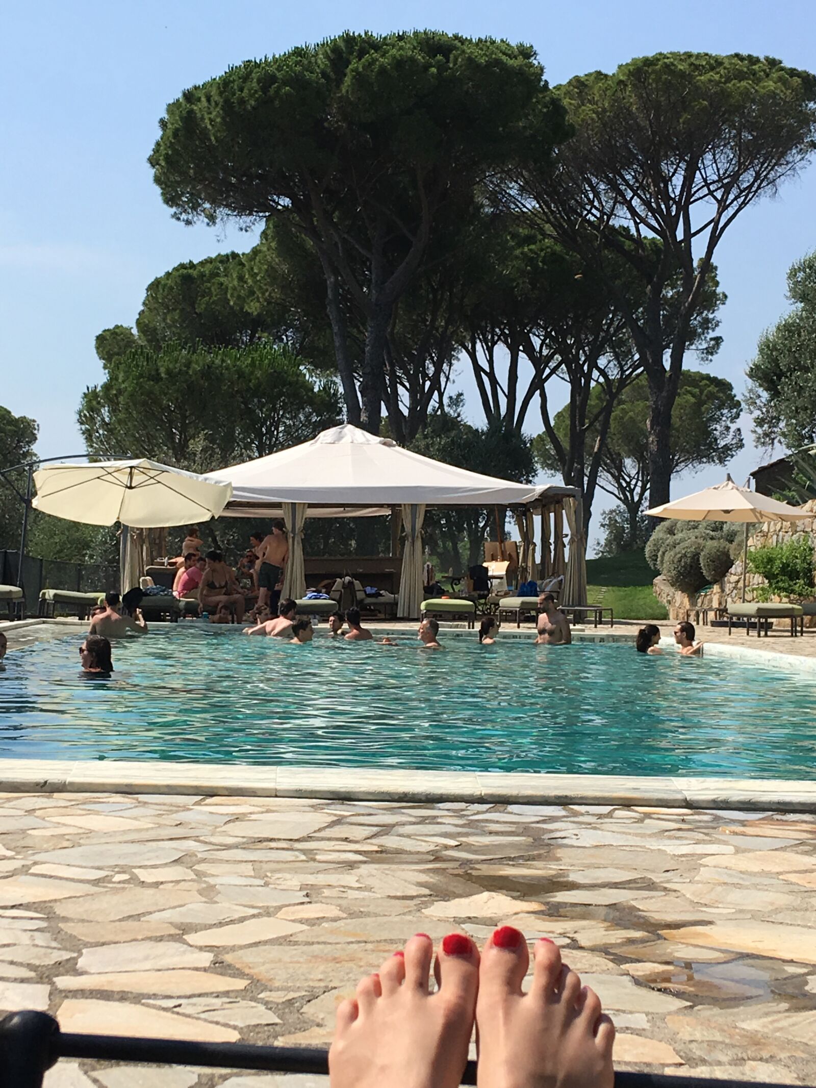 iPhone SE back camera 4.15mm f/2.2 sample photo. Relax, swimming pool, feet photography