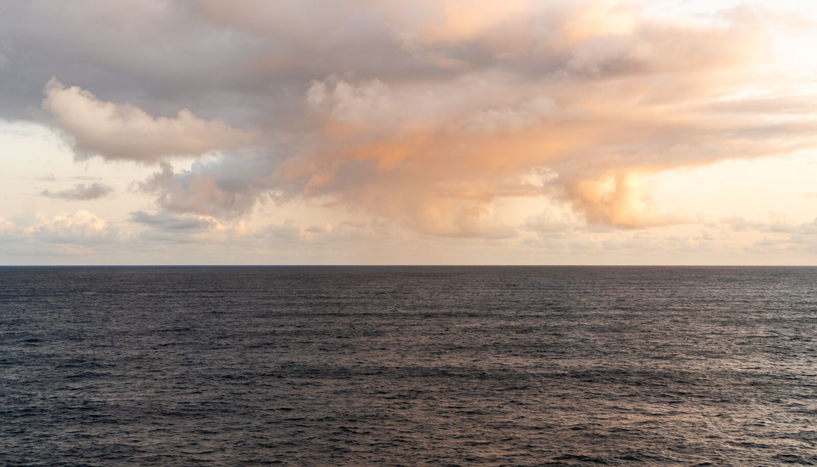 Sony a7R II + Sony FE 24-240mm F3.5-6.3 OSS sample photo. Sunset, north sea, clouds photography
