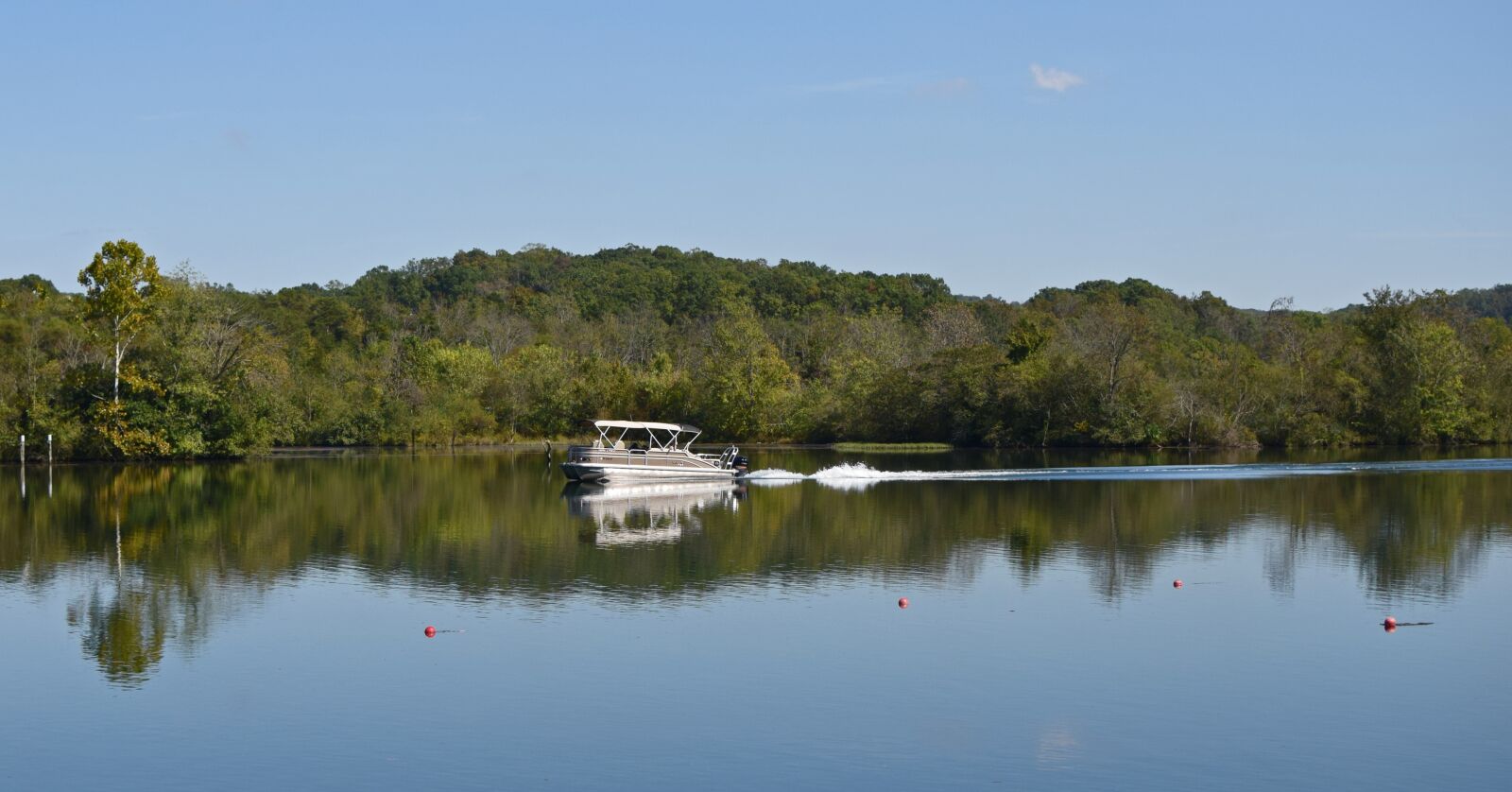 Nikon D3300 sample photo. Motor-boating fisherman, lake, nature photography