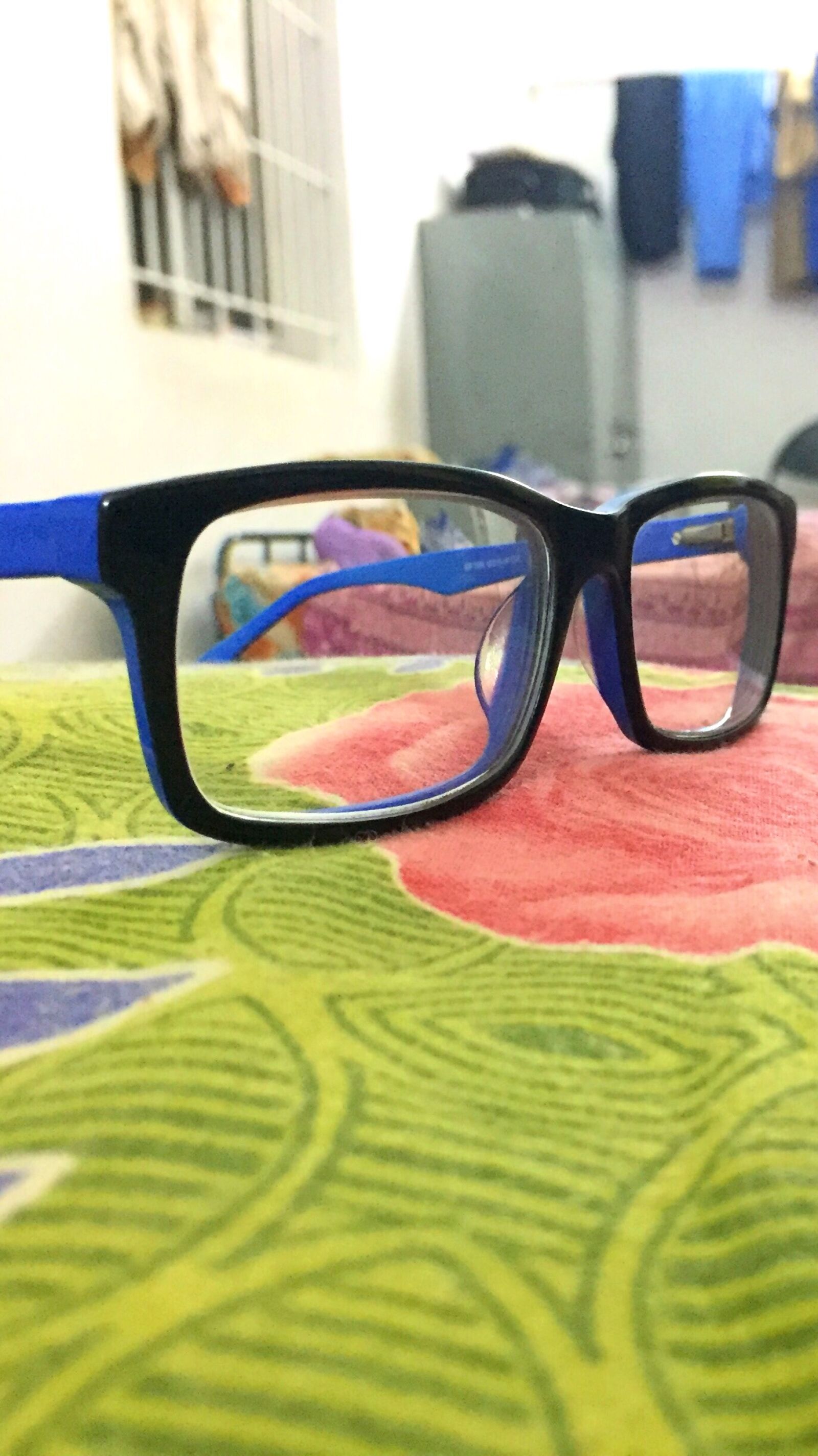 iPhone 6 back camera 4.15mm f/2.2 sample photo. Spectacles photography