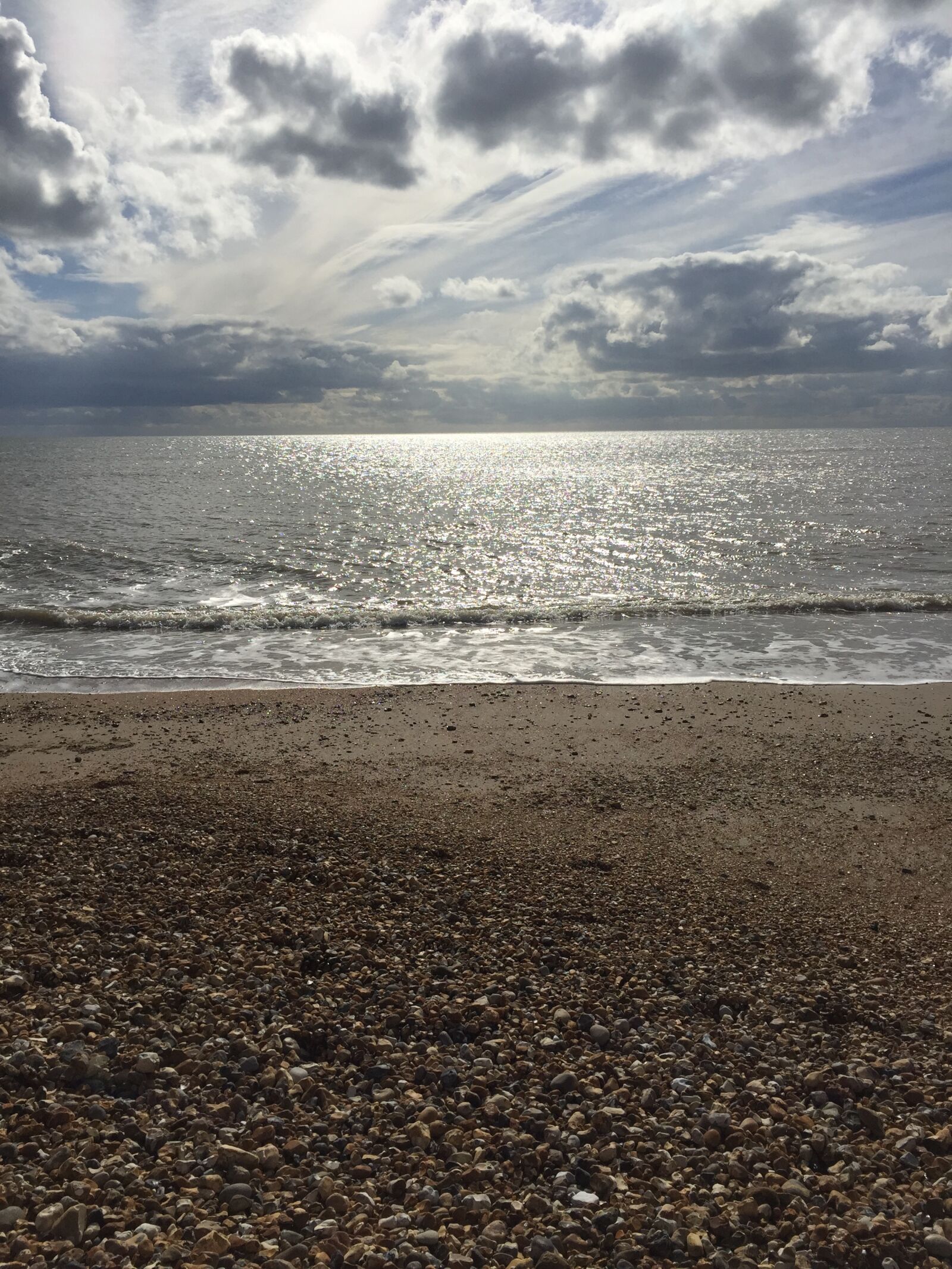 Apple iPhone 6 sample photo. Clouds, form, pebble, beach photography