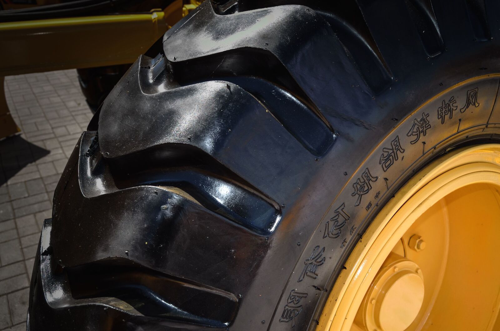 Nikon D5100 sample photo. Tire, machine, wheel, reflection photography