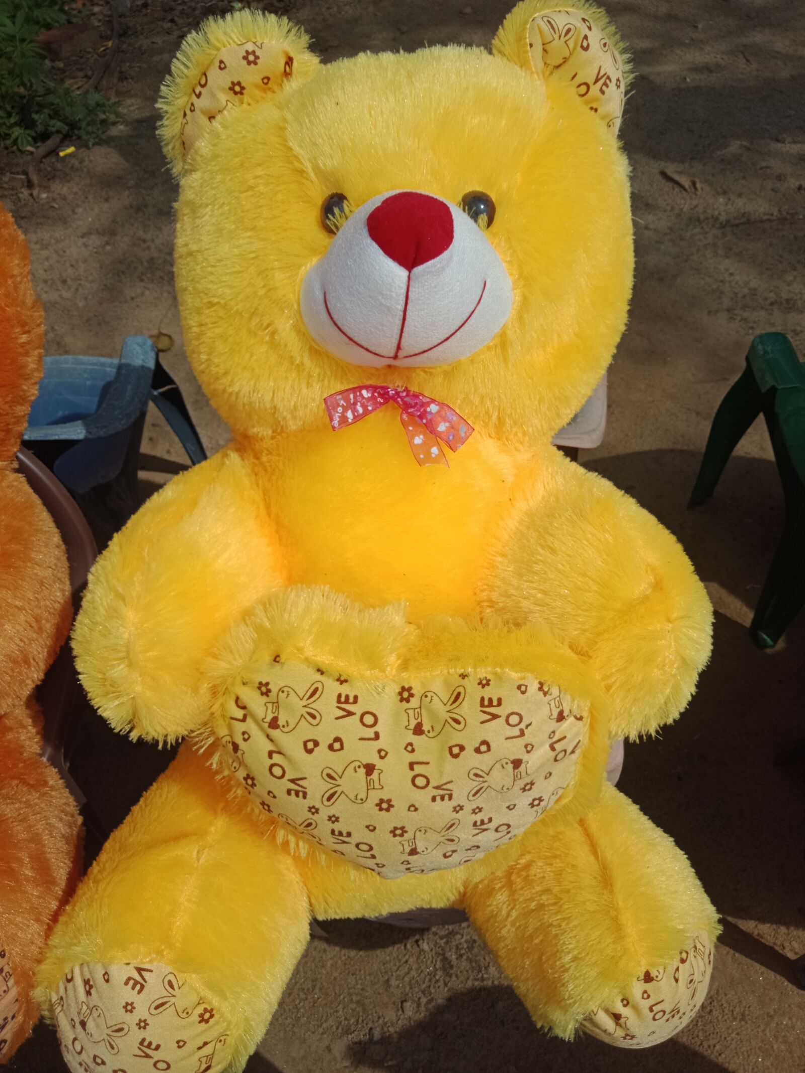 OPPO A83 sample photo. Teddy bear, yellow, red photography