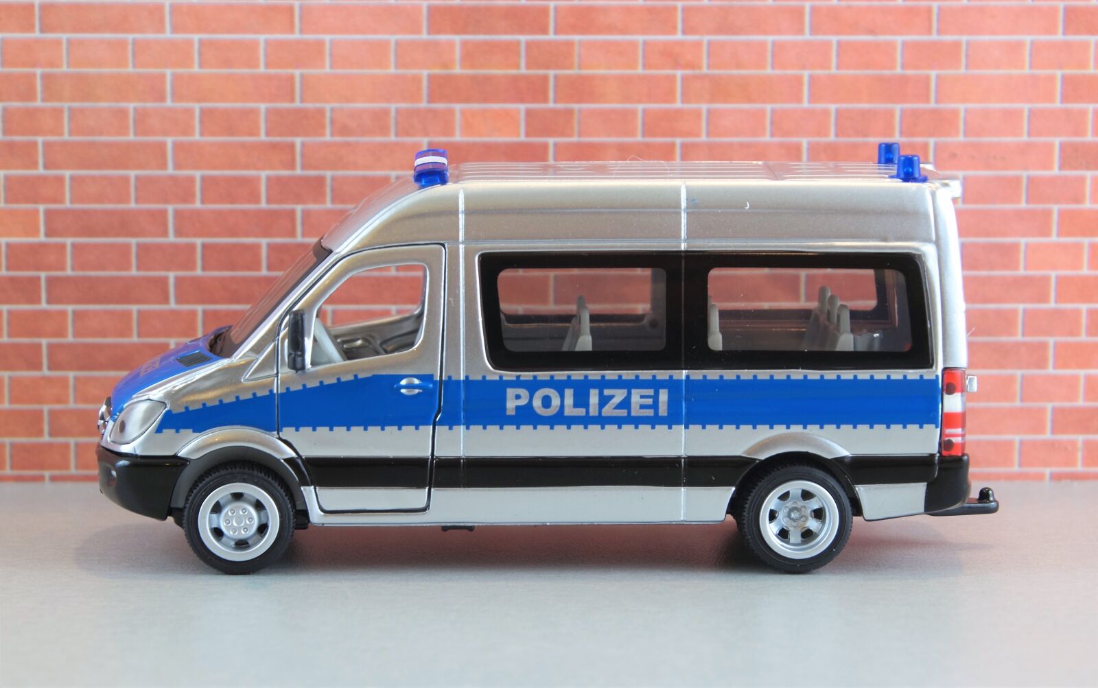 Sony DT 18-70mm F3.5-5.6 sample photo. Model car, auto, police photography