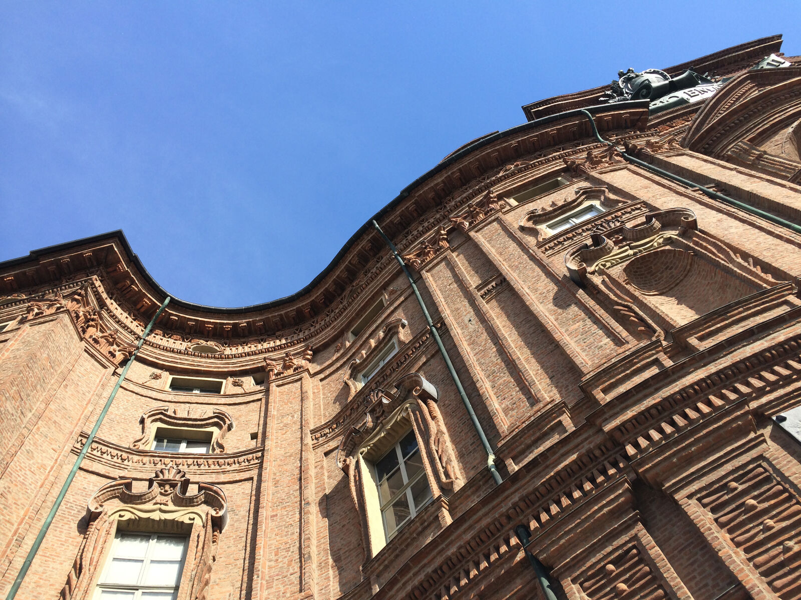 iPhone 5s back camera 4.12mm f/2.2 sample photo. Architecture, blue, sky, bricks photography