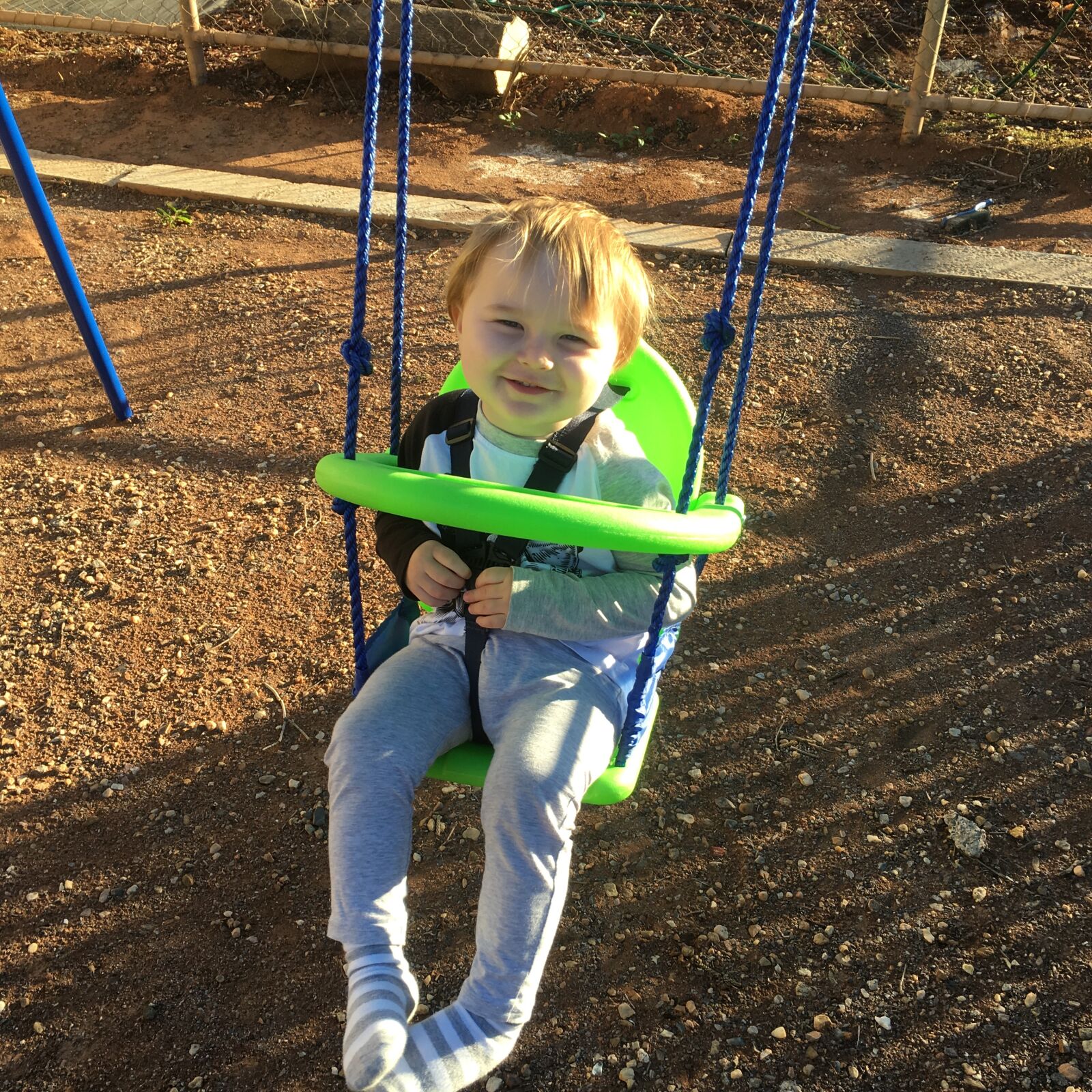 iPhone 6s back camera 4.15mm f/2.2 sample photo. Little, boy, smile, swing photography