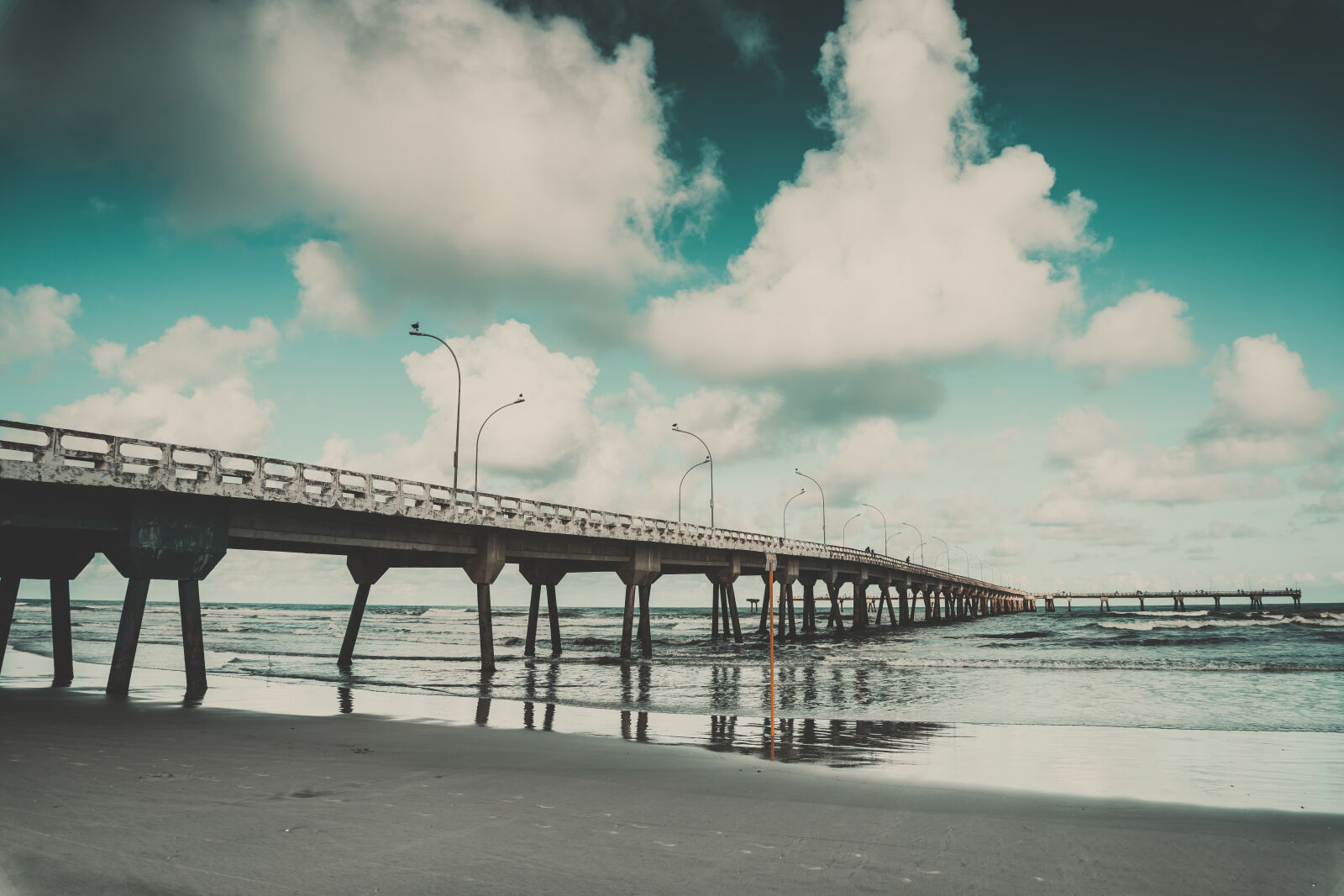 Sony a6300 sample photo. Beach, bridge, clouds, dock photography