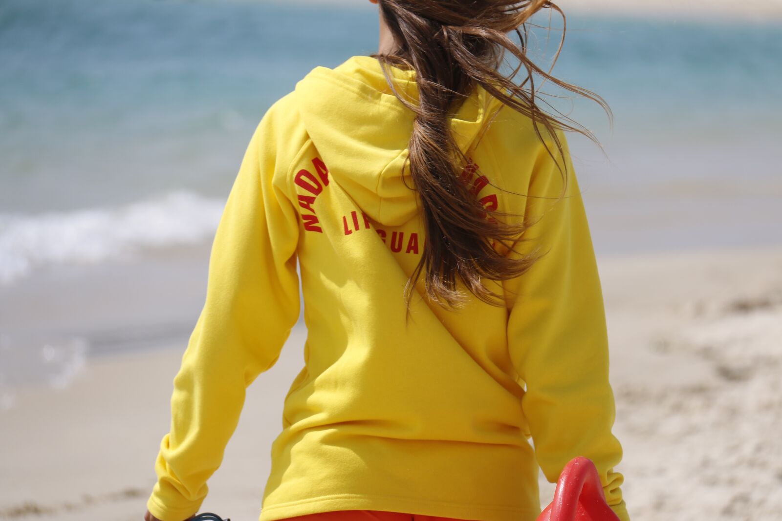 Canon EF-S 18-200mm F3.5-5.6 IS sample photo. Lifeguard, yellow, vigilant photography