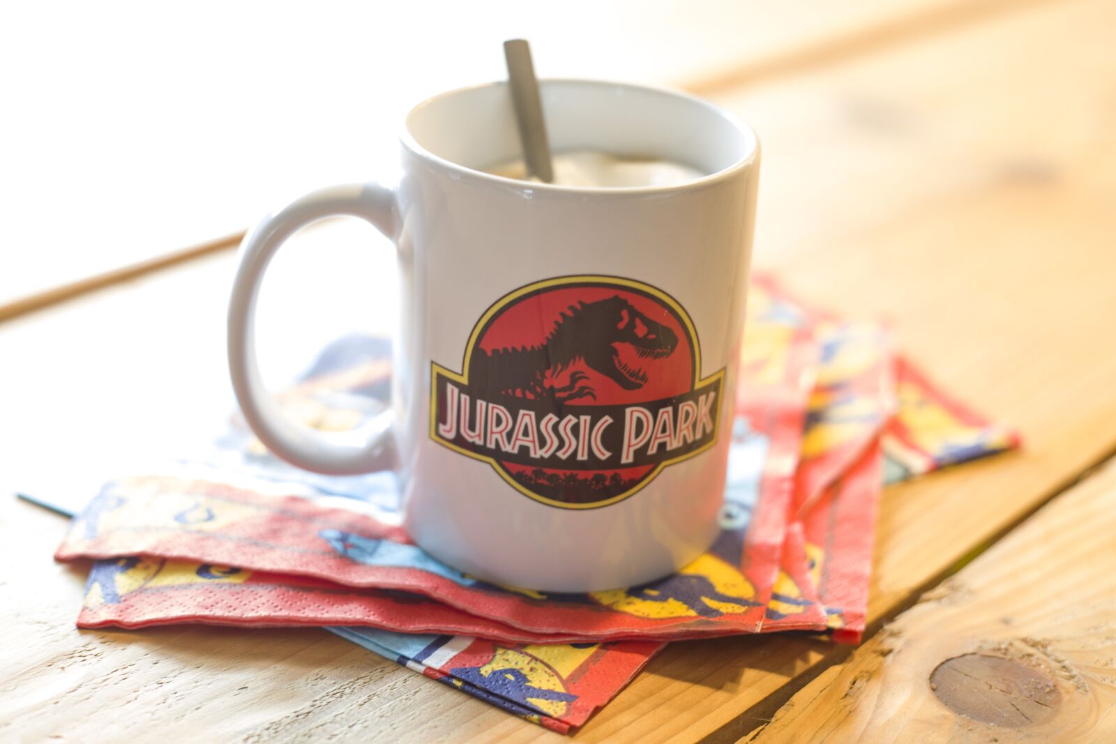 Canon EF 50mm F1.8 II sample photo. Jurassic park, cup, coffee photography