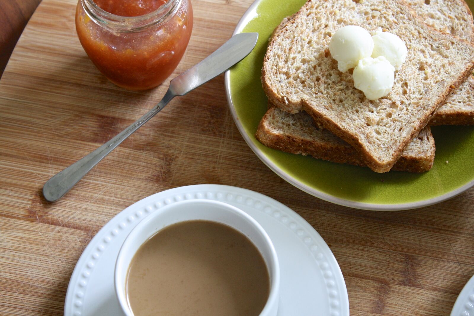 Canon EOS 1000D (EOS Digital Rebel XS / EOS Kiss F) sample photo. Breakfast, butter, sprouted bread photography
