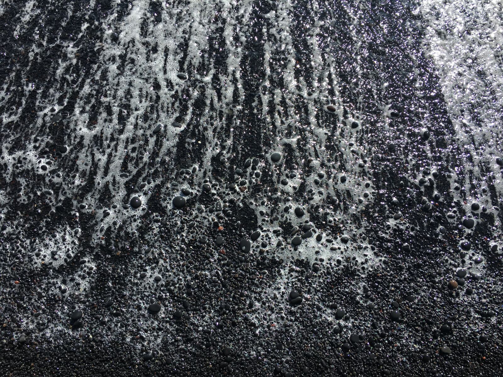 Apple iPhone 6s sample photo. Water, black, sand photography