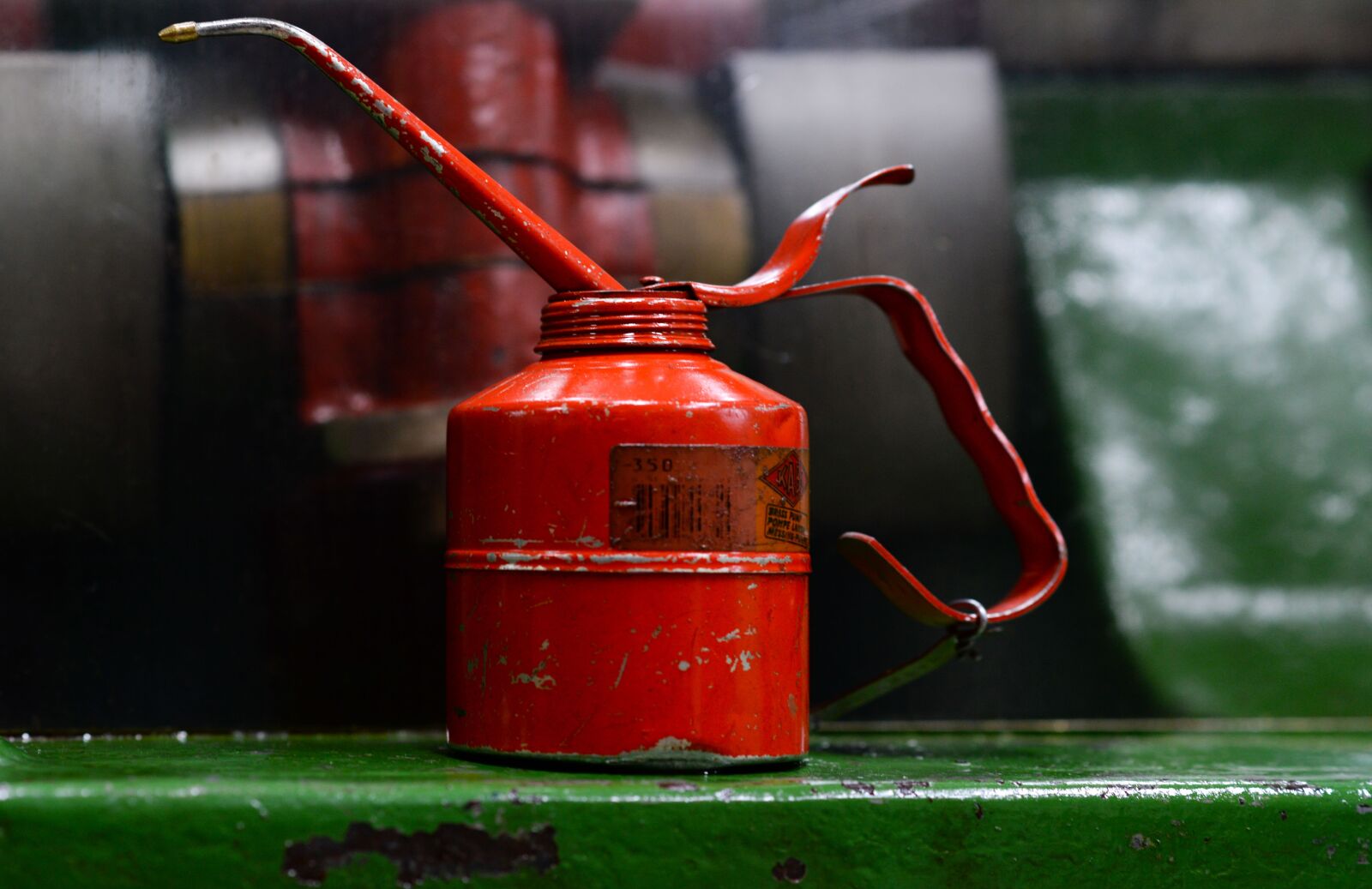 Nikon D610 sample photo. Oil, can, product photography