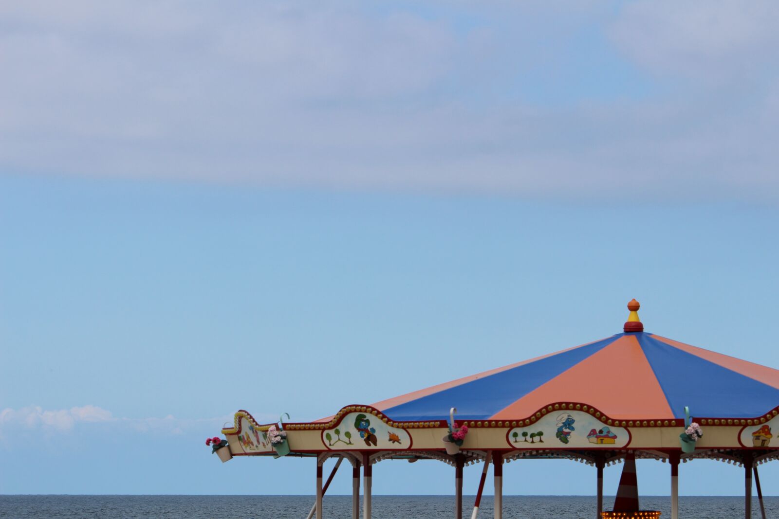 Canon EF-S 55-250mm F4-5.6 IS STM sample photo. Carousel, holidays, coast photography