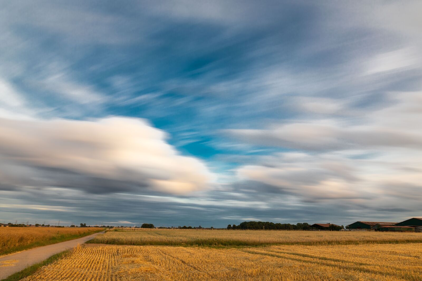 Canon EOS 5D Mark IV + Canon EF 16-35mm F4L IS USM sample photo. Wind, clouds, field photography