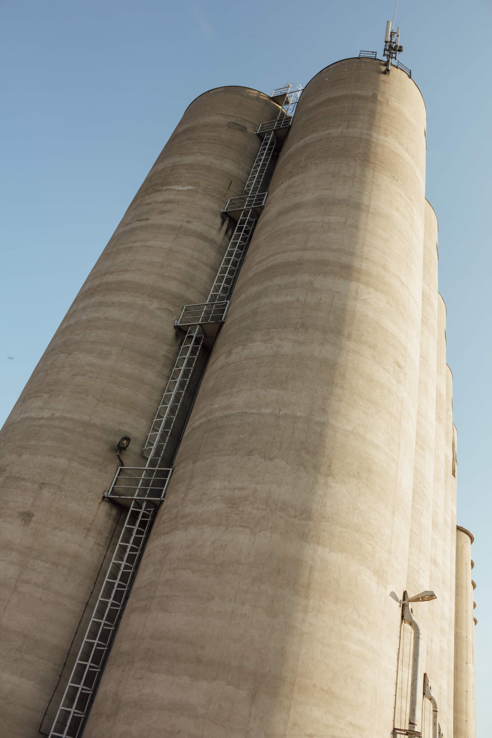 Canon EF-S 18-55mm F3.5-5.6 IS sample photo. Silo, storage, staircase, industry photography