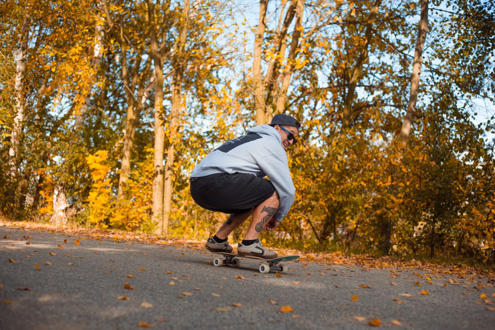 Canon EF 50mm F1.8 II sample photo. Skateboard, man, autumn photography