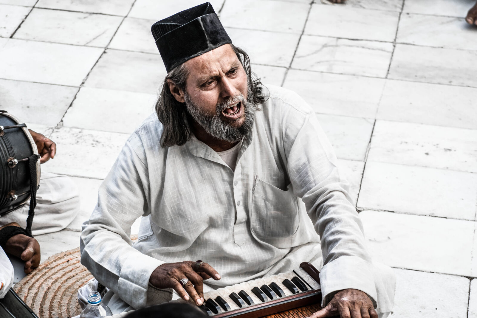 Nikon D5300 sample photo. Man, sitting, holding, instrument photography