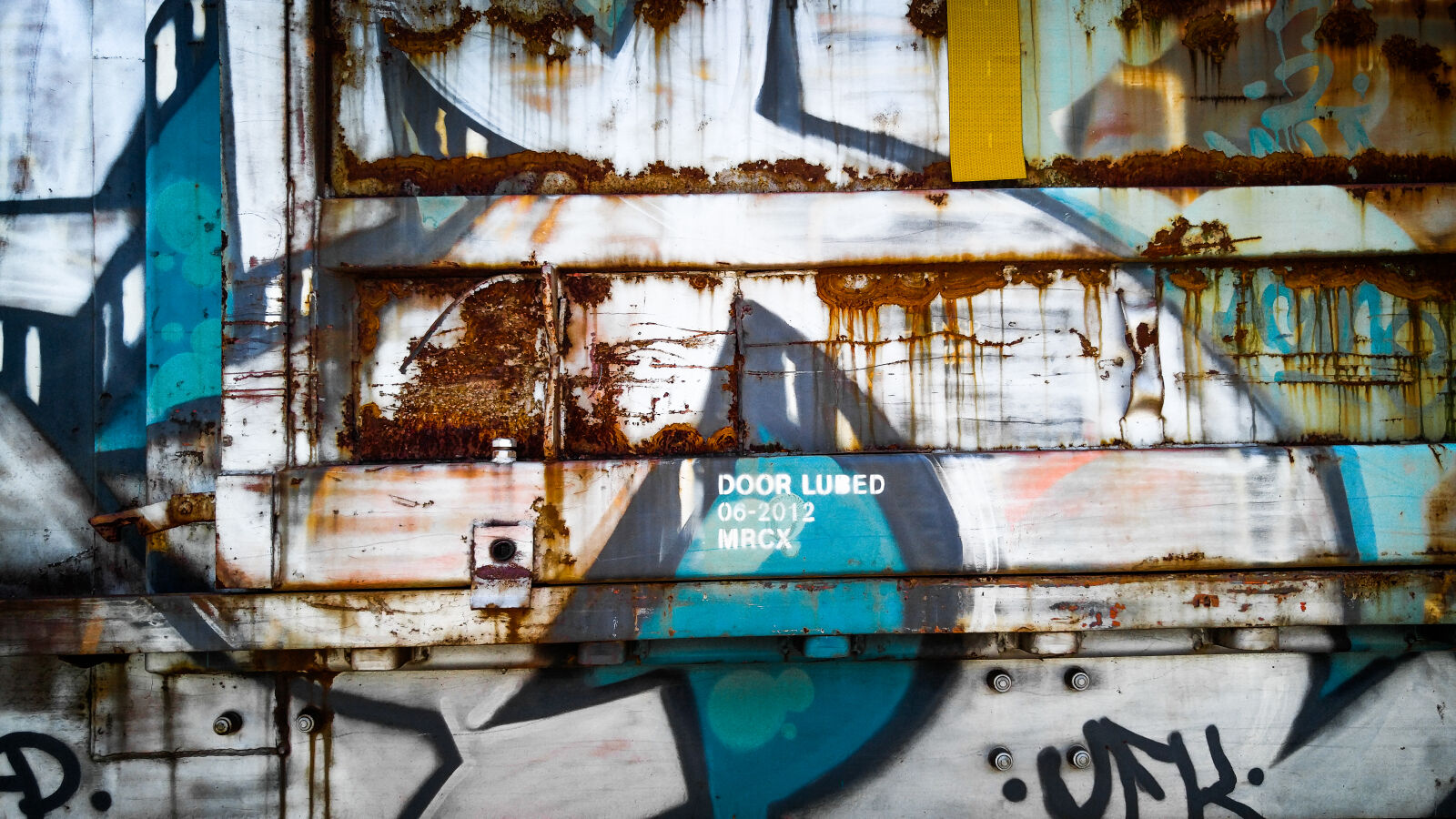 LG V10 sample photo. Graffiti, rust, train photography