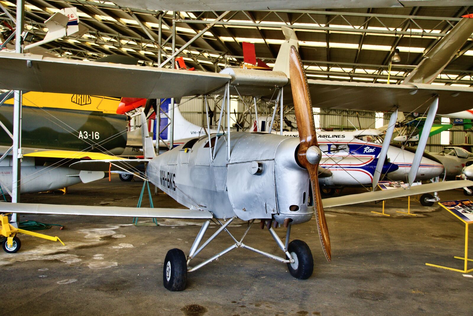Sony E 18-135mm F3.5-5.6 OSS sample photo. Biplane, museum, vintage photography
