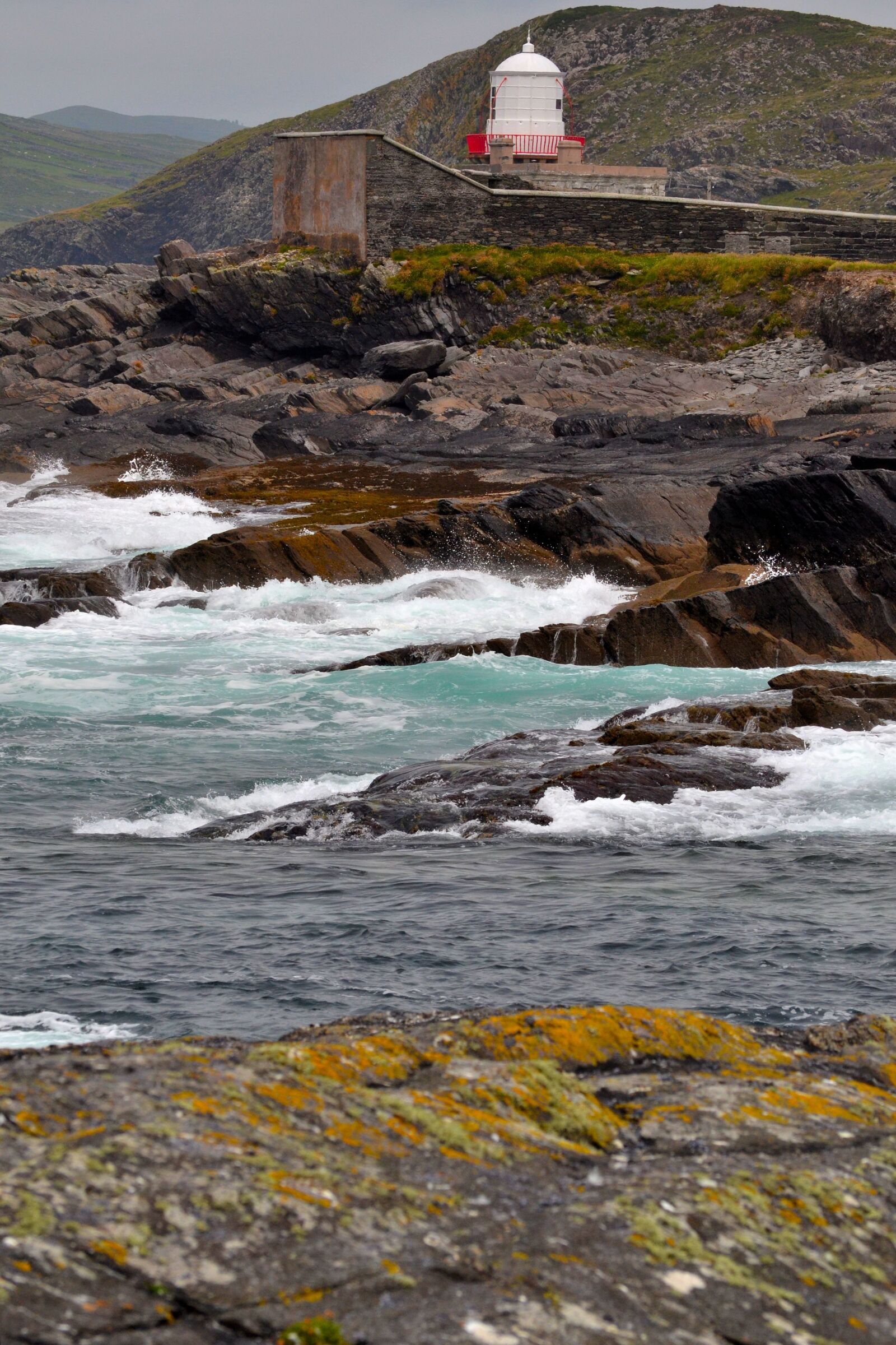 Nikon D3100 sample photo. Lighthouse, rocks, sea photography