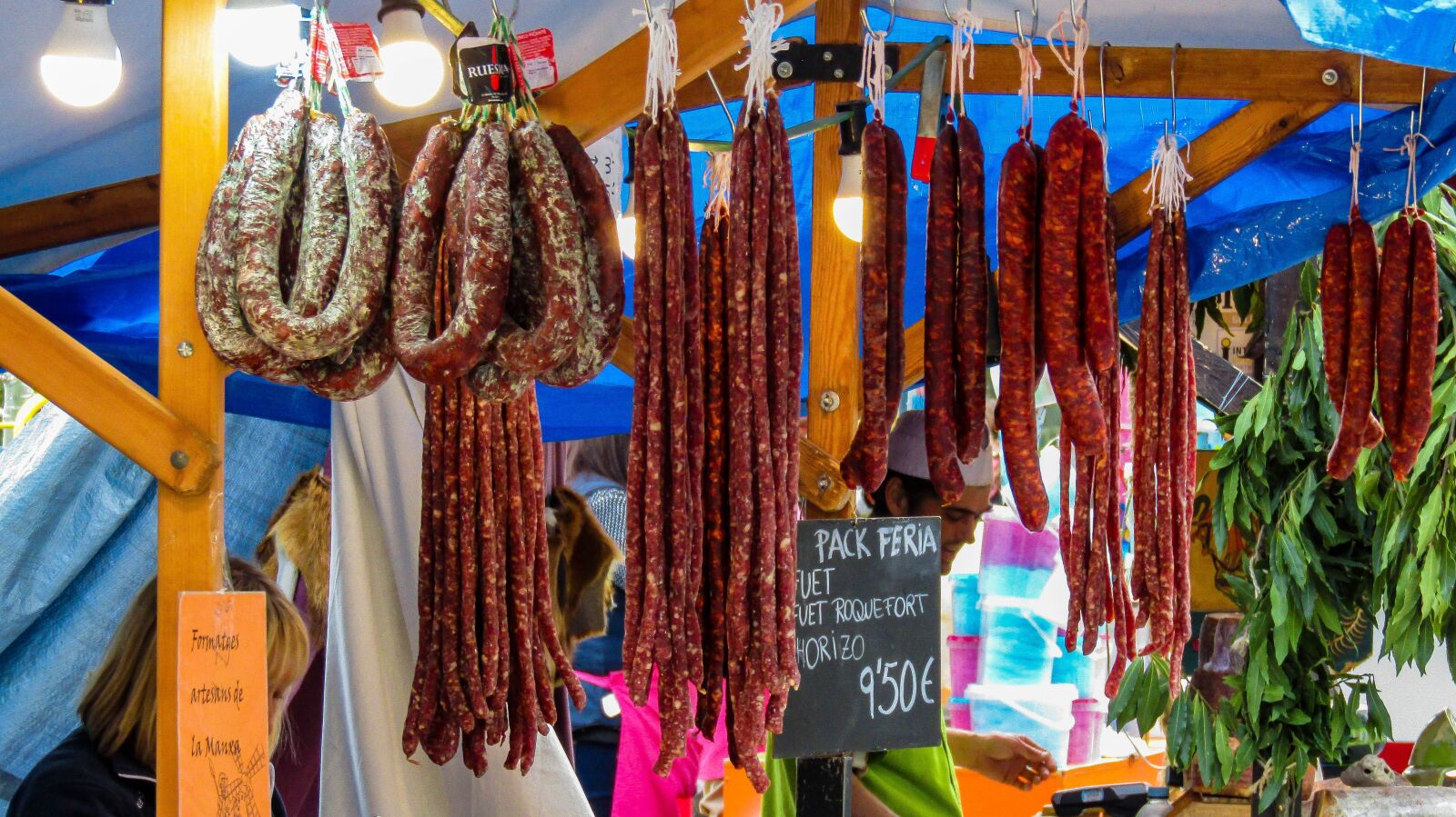 Canon PowerShot SX410 IS sample photo. Sausages, hangs, market photography