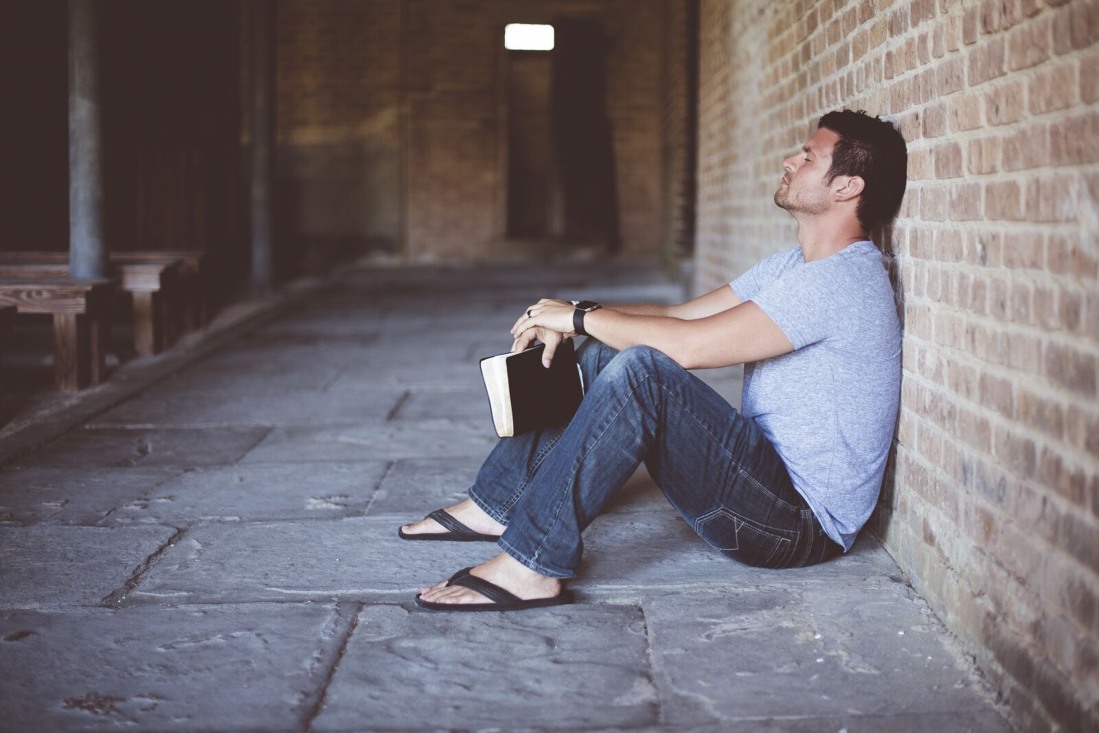 Nikon D750 sample photo. Alone, book, brick wall photography