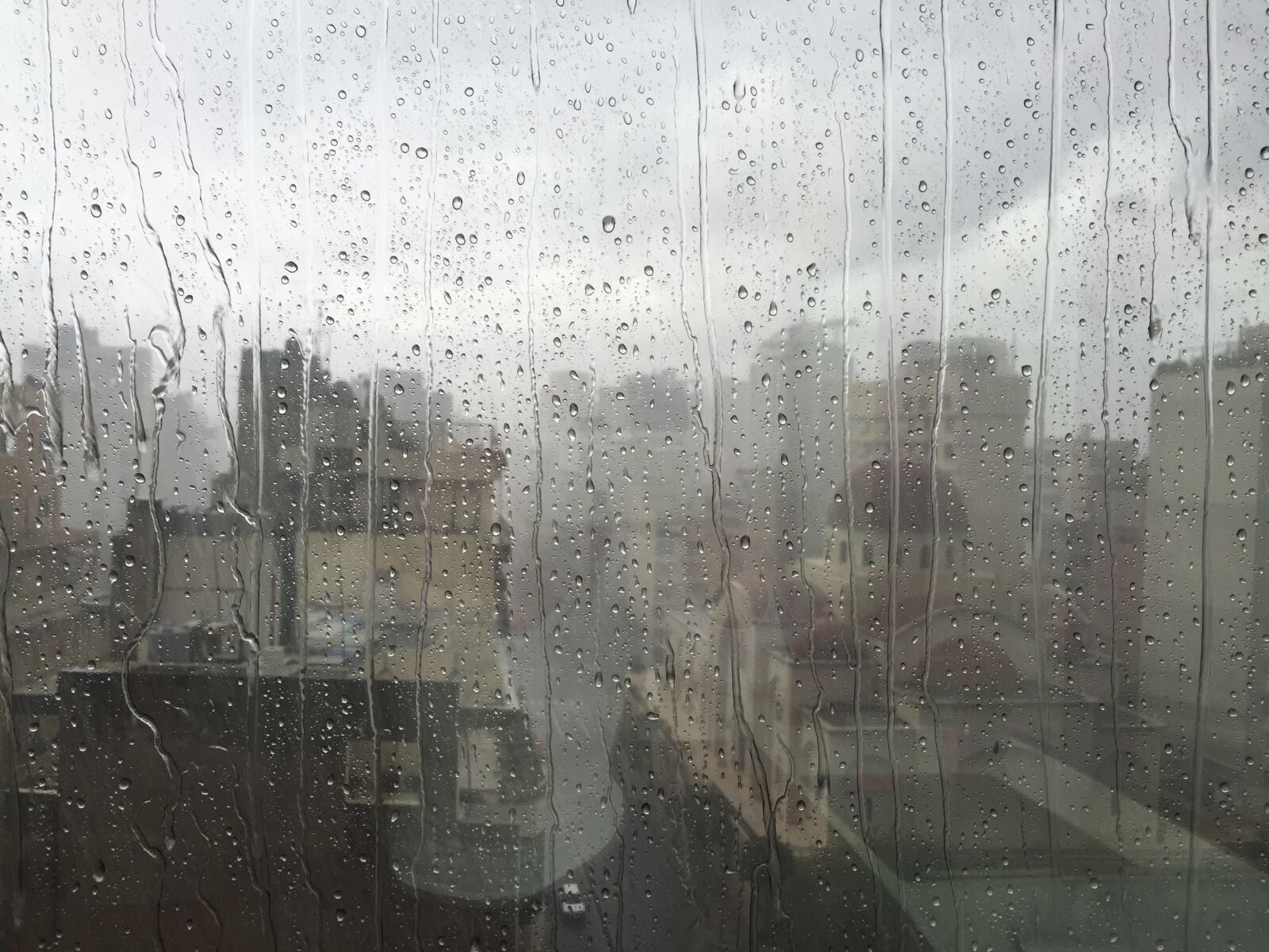 iPhone 6 back camera 4.15mm f/2.2 sample photo. Window, rain, beirut photography