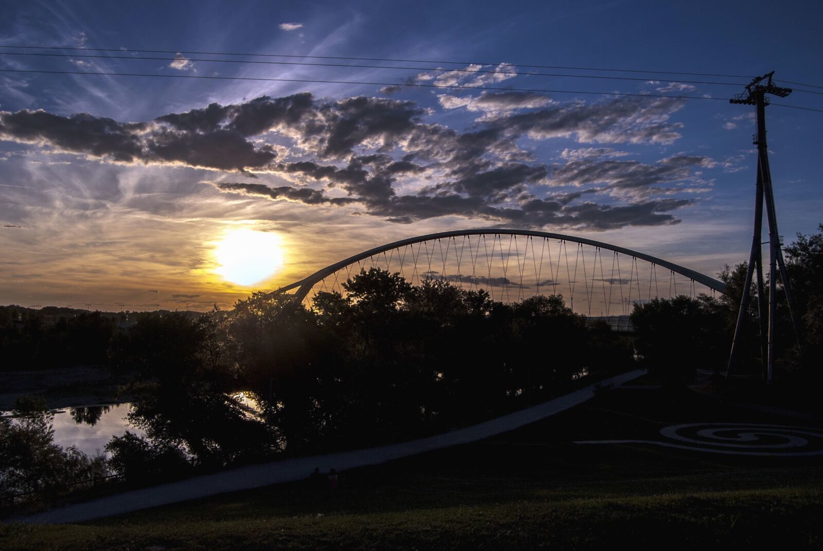 Nikon D3000 sample photo. Dusk, water, sun, bridge photography