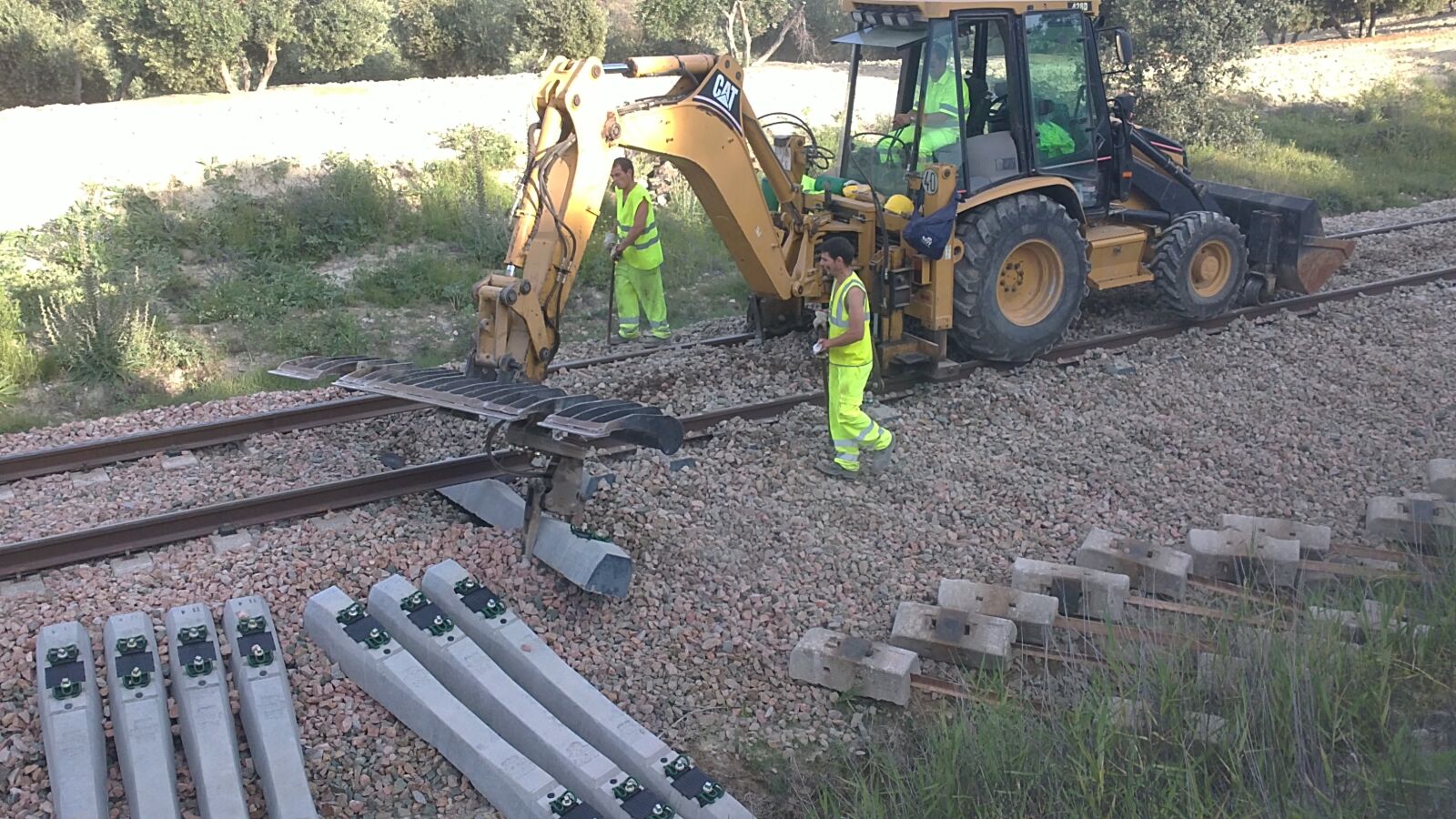 Sony Ericsson U5i sample photo. Train, sleepers, excavator photography