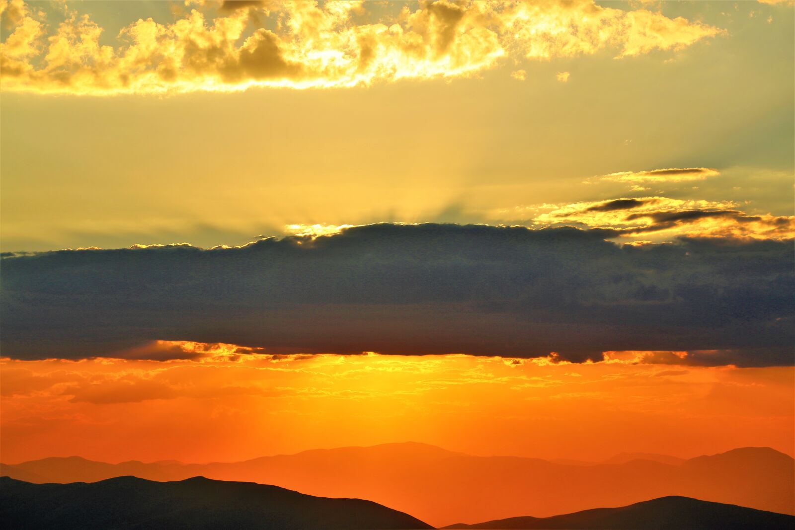 Canon EF 70-300mm F4-5.6L IS USM sample photo. Sunset, solar, cloud photography