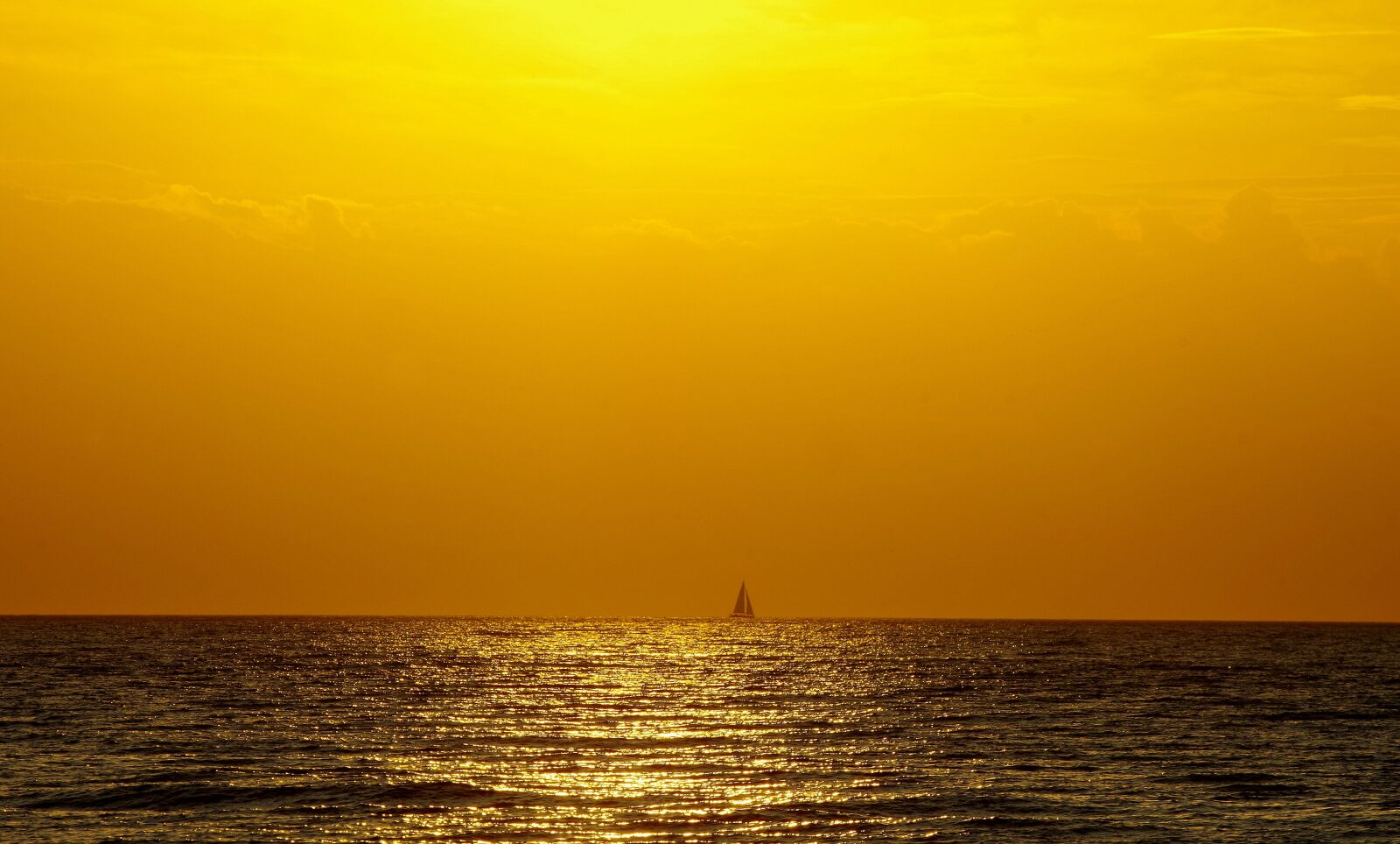 Pentax K-30 sample photo. Sail, horizon, orange photography