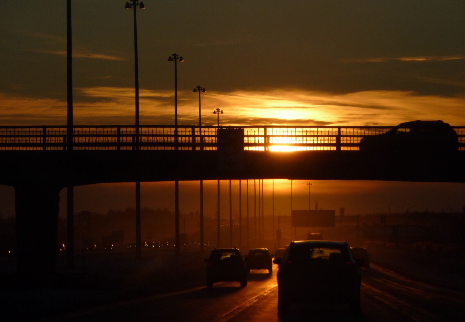 Panasonic Lumix DMC-TZ5 sample photo. Traffic, sunset, street lights photography