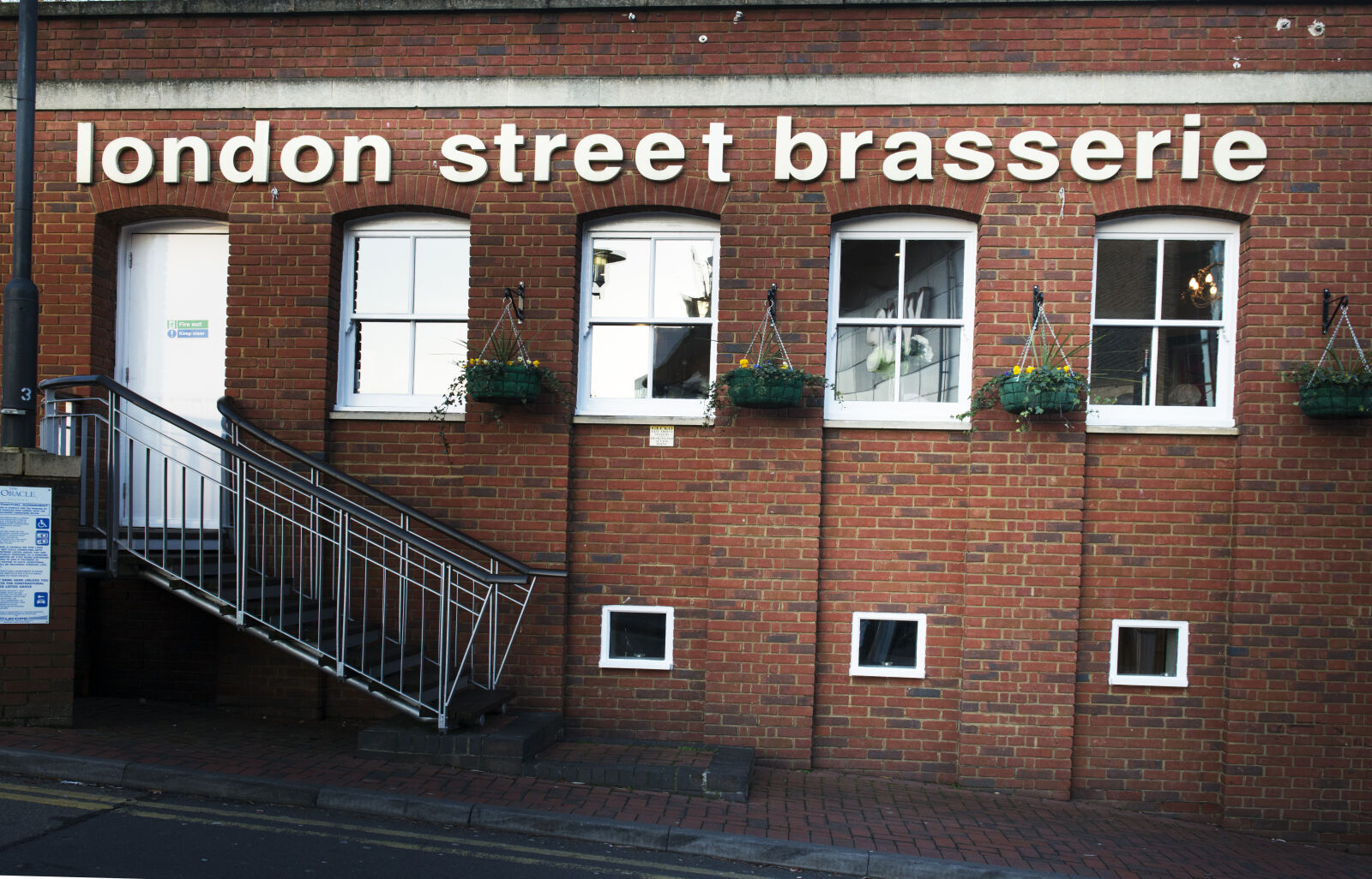 Nikon AF-S Nikkor 24-70mm F2.8G ED sample photo. Brasserie, building, red, bricks photography