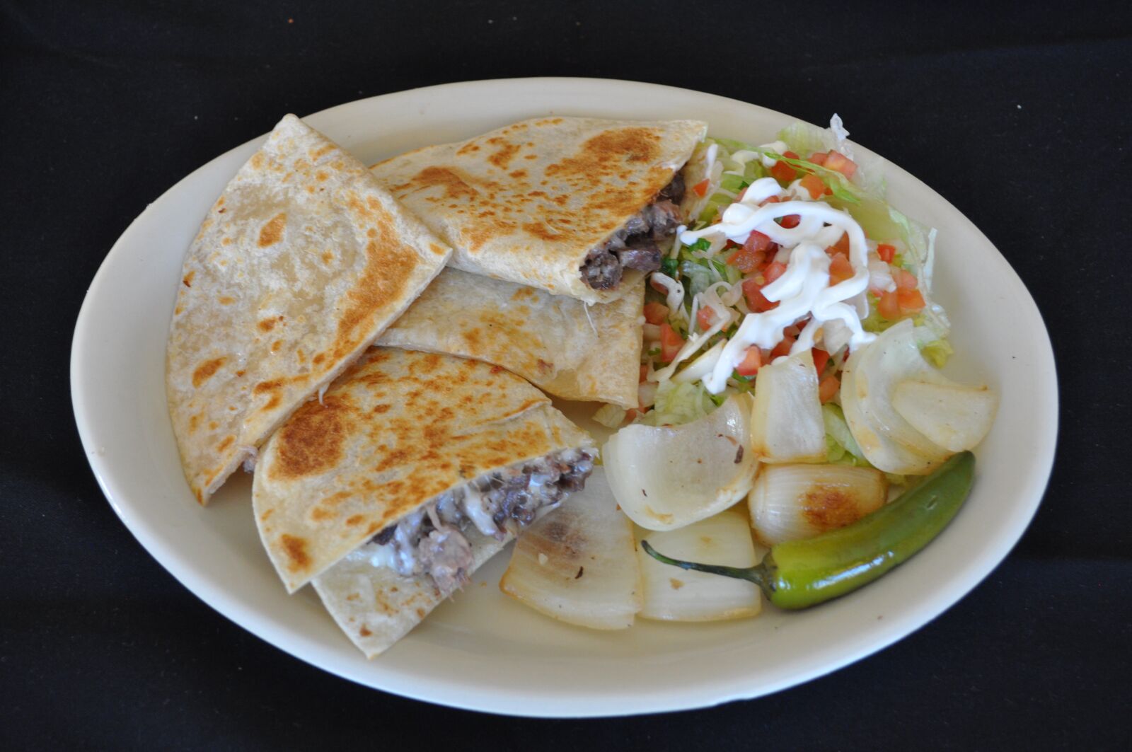 Nikon D5000 sample photo. Mexican food, quesadilla, party photography